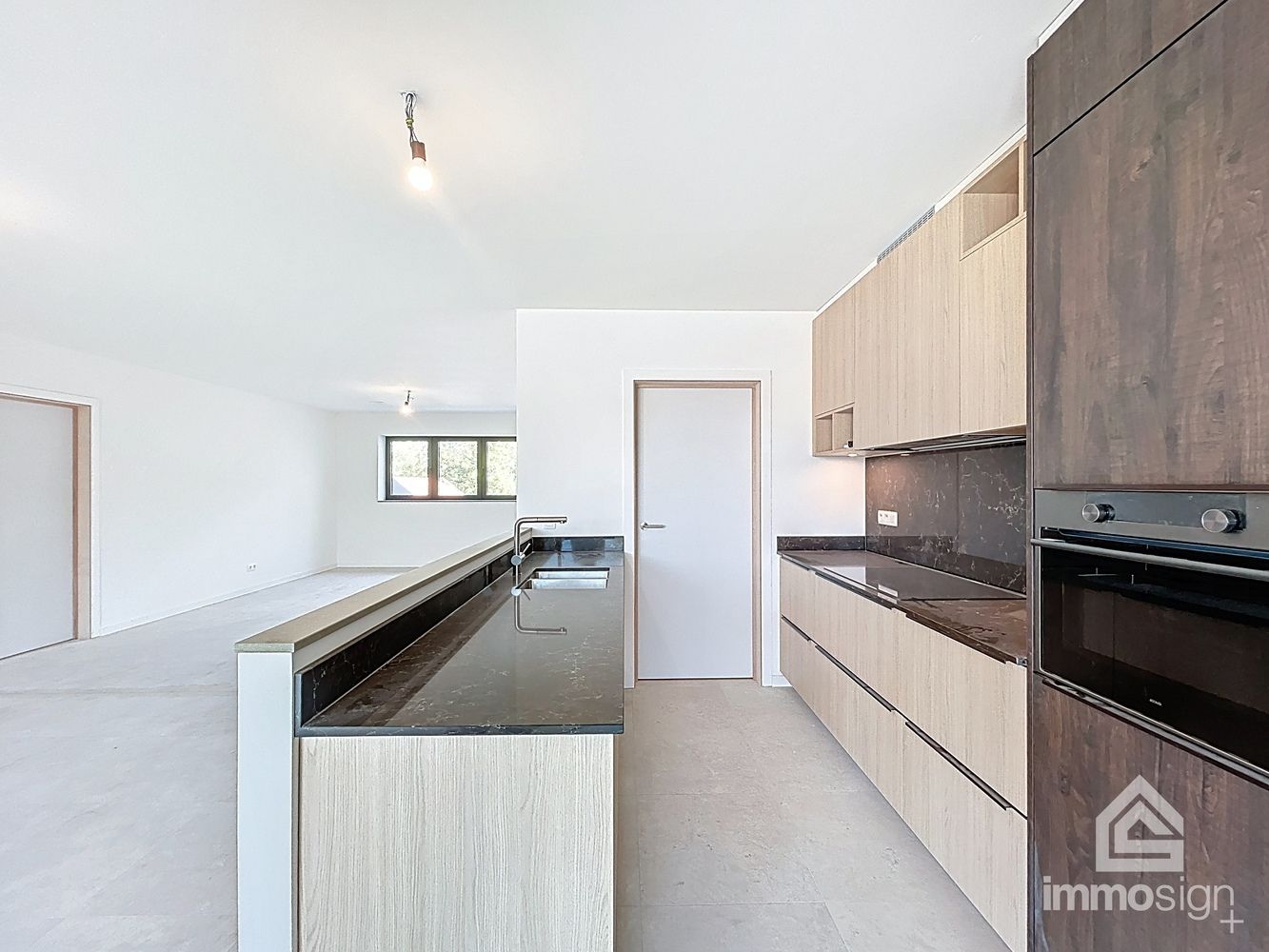 Instapklaar nieuwbouw appartement met 3 slaapkamers, 2 parkeerplaatsen, terras en kelderberging te Kinrooi foto 2