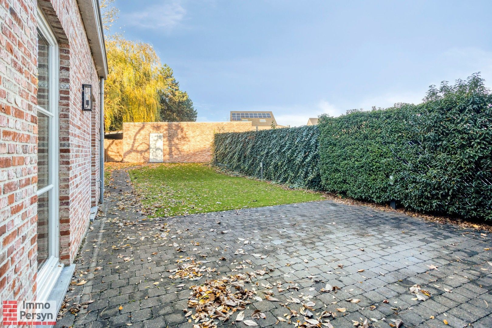 Ruim gelijkvloers appartement met tuin en 2 staanplaatsen. foto 29