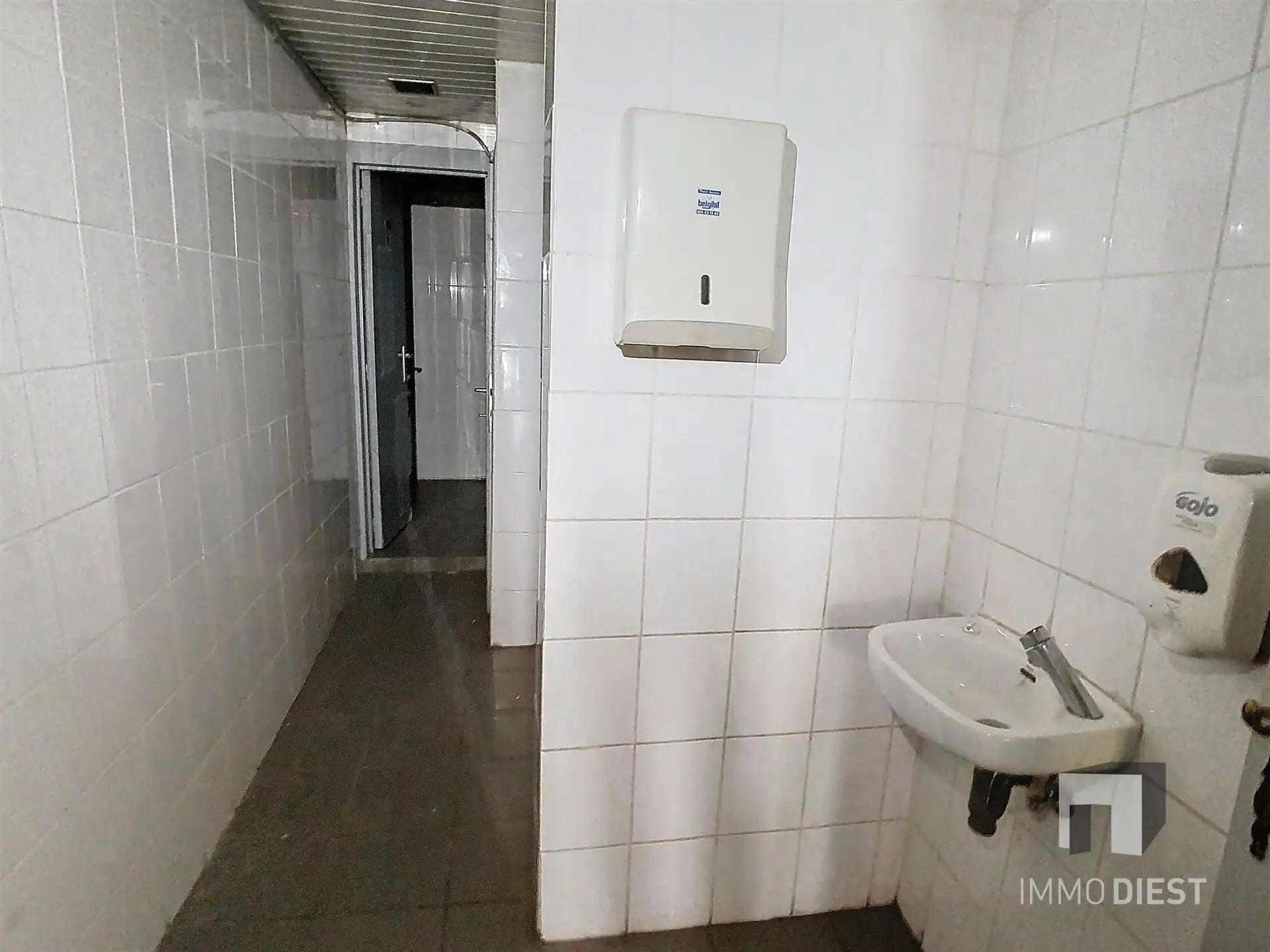 Handelspand 180m2 gelijkvloers op 3,47are met achterliggende tuin foto 18