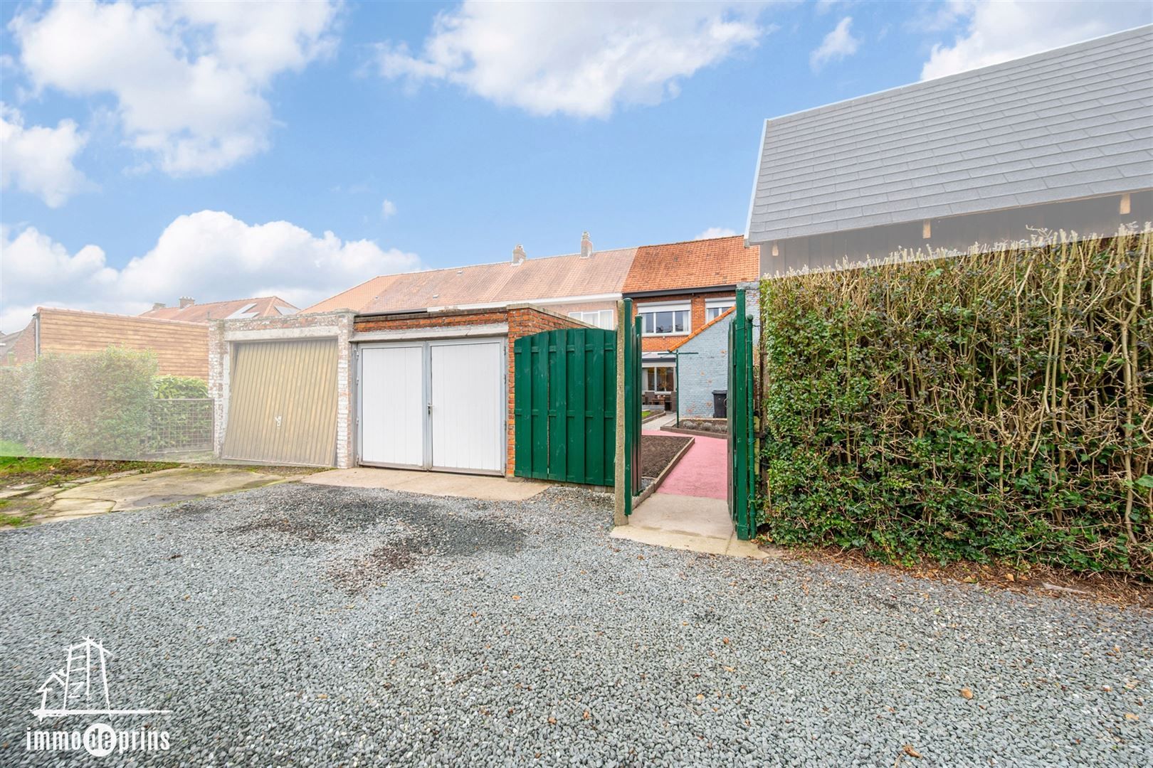 Woning met garage foto 26