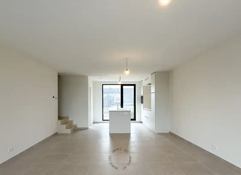 Prachtig gelegen nieuwbouw duplexappartement met drie slaapkamers, groot terras en autostaanplaats foto 3