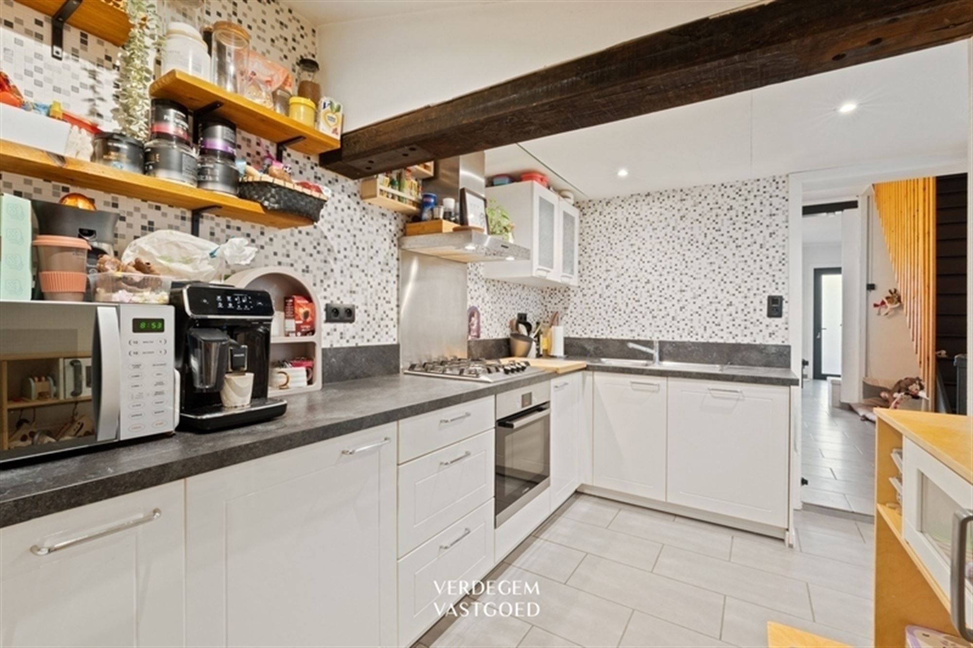 Gezellige gezinswoning met tuin en werkplaats in het centrum foto 7