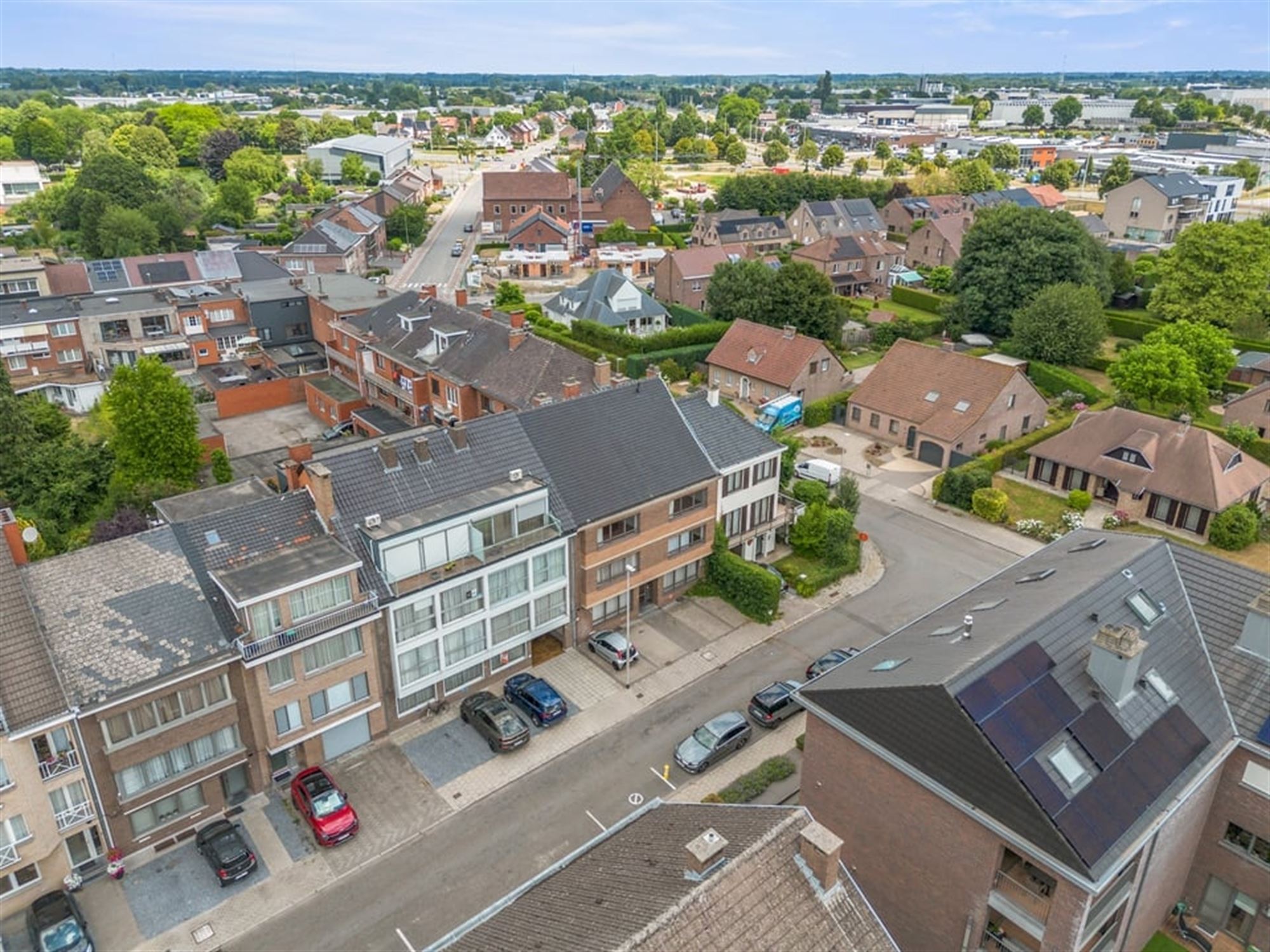 OPBRENGSTEIGENDOM MET 6 APPARTEMENTEN EN 4 STAANPLAATSEN IN SINT-TRUIDEN  foto 7