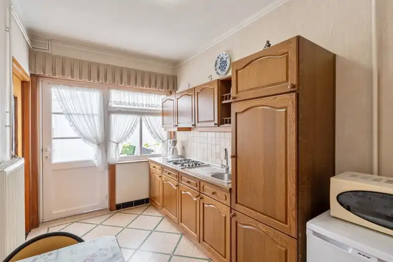 Verzorgde woning met onderhoudsvriendelijke tuin op 2are 55ca en gelegen in het centrum van Kortenaken foto 11