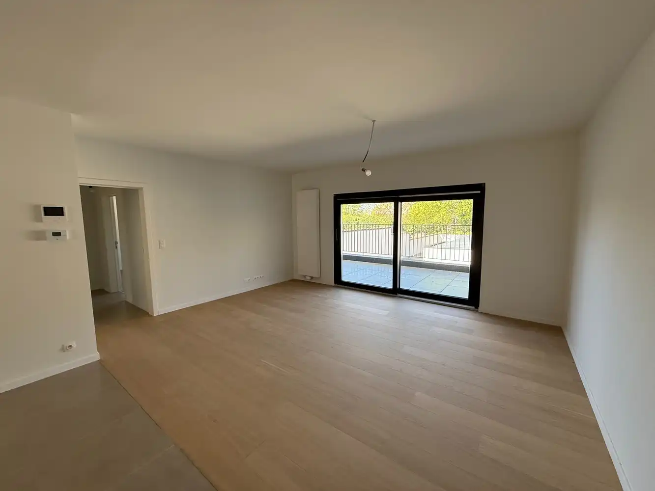 Ruim nieuwbouwappartement met 2 slaapkamers én parkeerplaats! foto 2