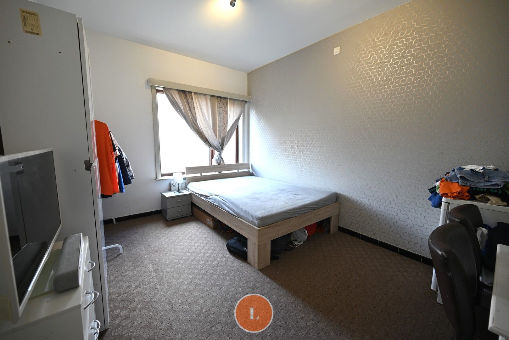 Opbrengst appartement met 2 slaapkamers en garage te koop in Roeselare! foto 9