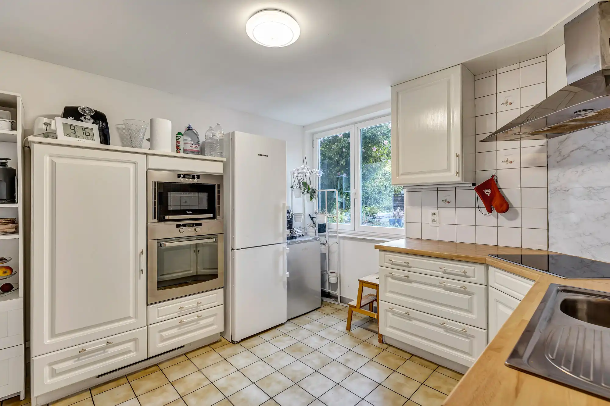 Gelijkvloers appartement met 3 slaapkamers en tuin! foto 3