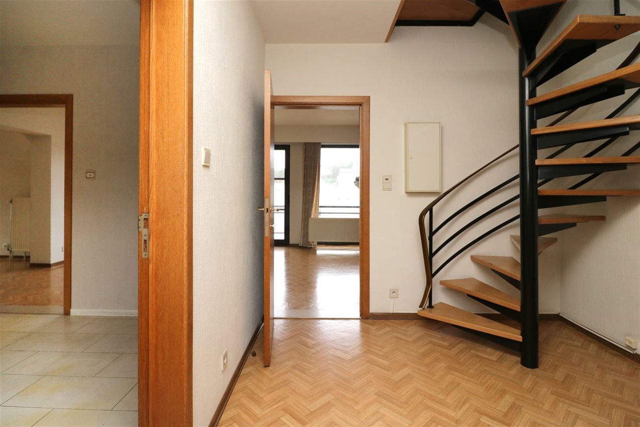 Centraal gelegen appartement met 3 slpk., garage en terras foto 14