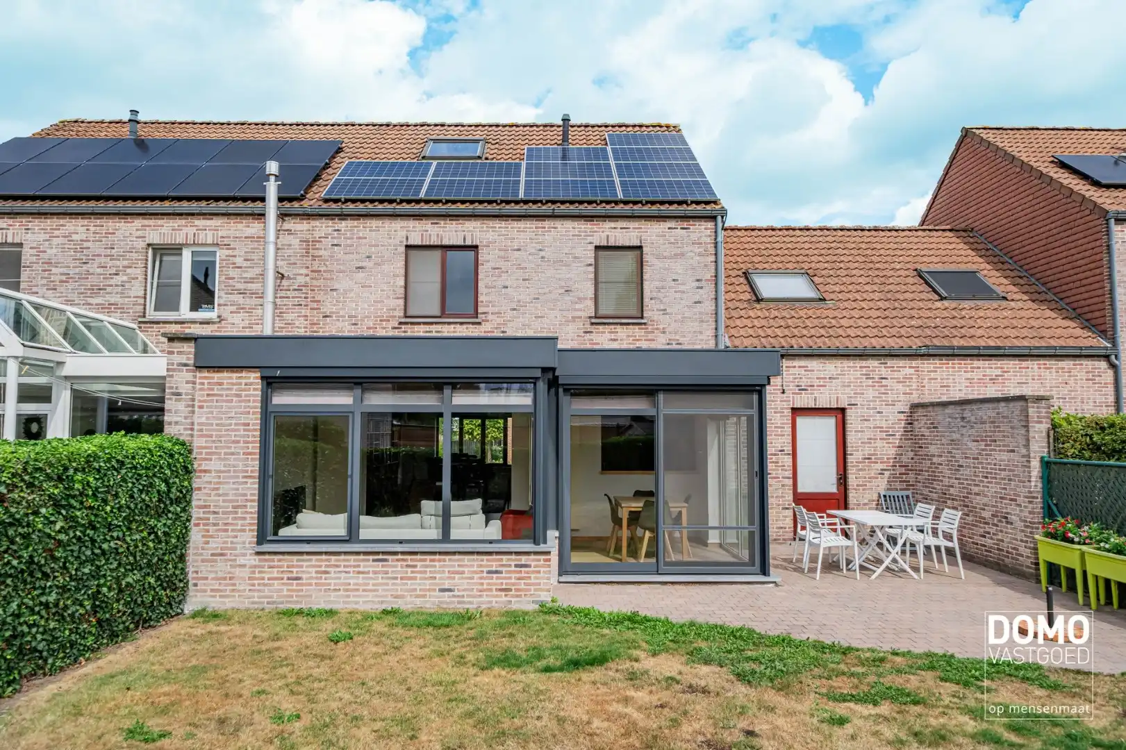 ZUIDWESTELIJK GEORIËNTEERDE DOORZONWONING MET LICHTRIJKE AANBOUW, GEZELLIGE TUIN EN RUIME GARAGE TE KURINGEN (HASSELT)  foto 32