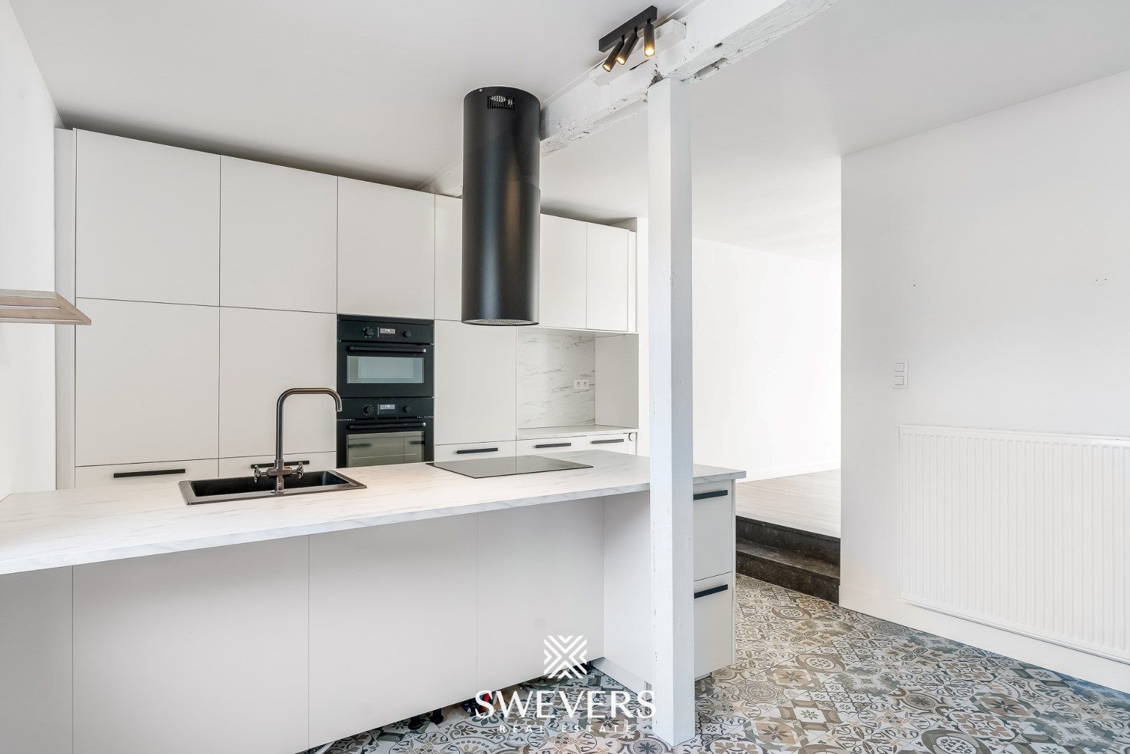 Ruim duplex appartement met knusse stadstuin in hartje Borgloon foto 11