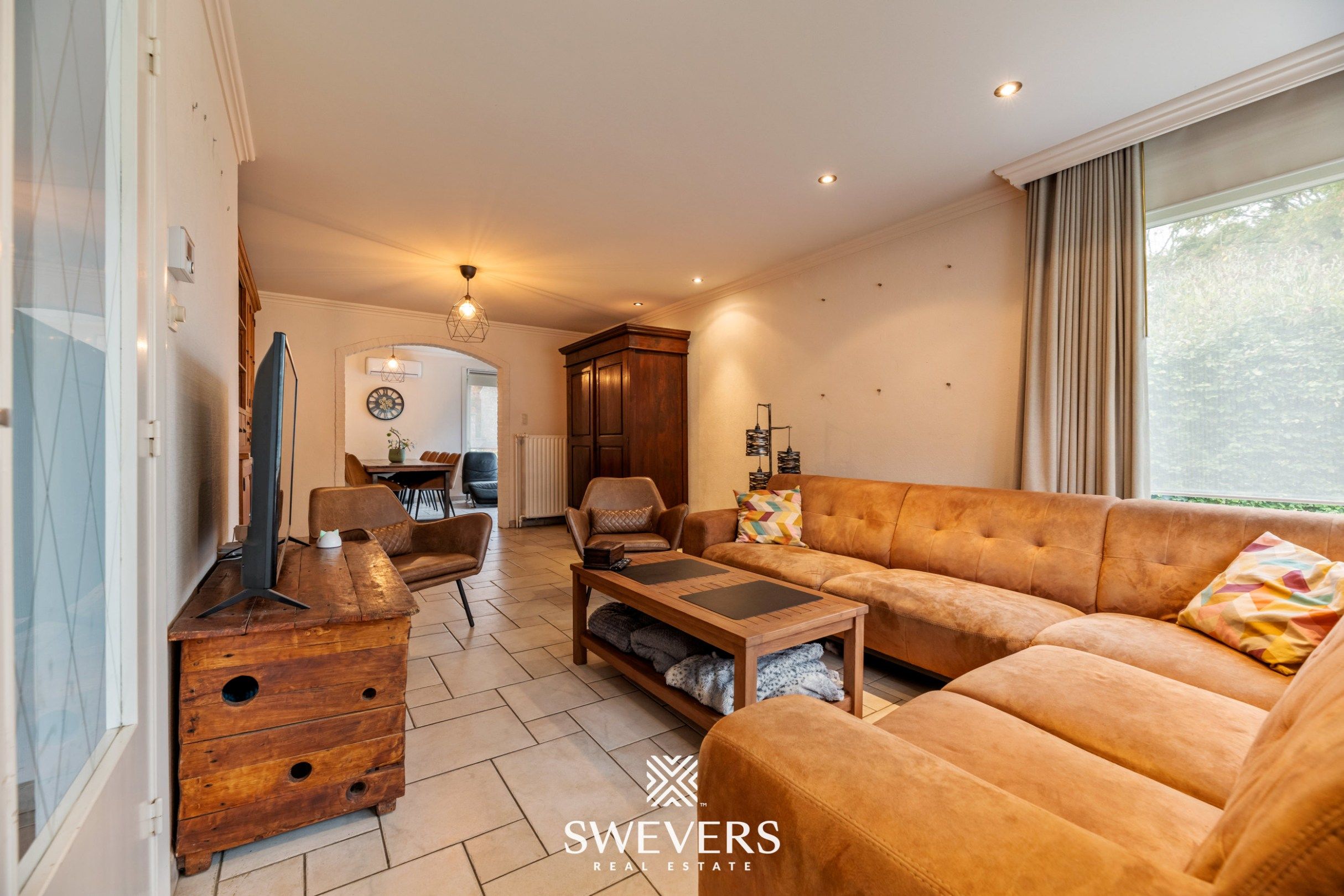 Instapklare gezinswoning met 3 slaapkamers, ruime kelder en zuidgerichte tuin in Beringen foto 5