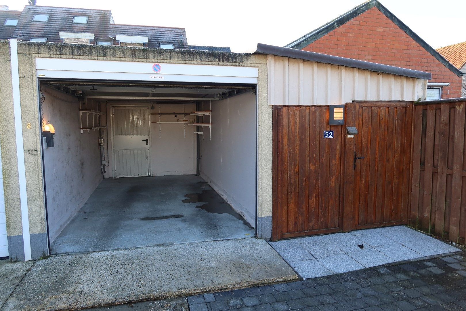 Gelijkvloers app met 2 slk, tuin en garage foto 20