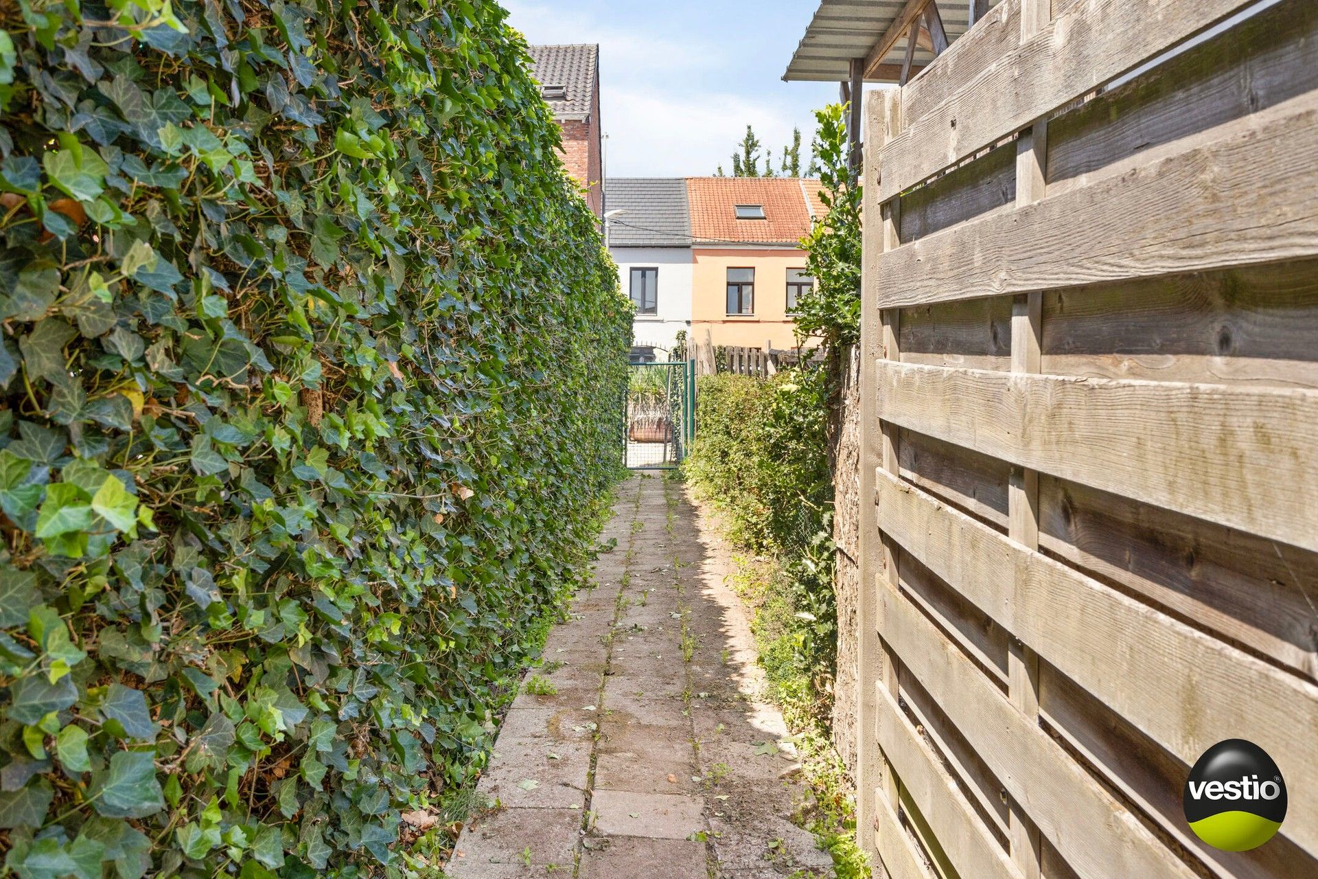 Schitterend gelegen stadswoning met grote tuin en mogelijkheid tot aankoop garagebox! foto 25