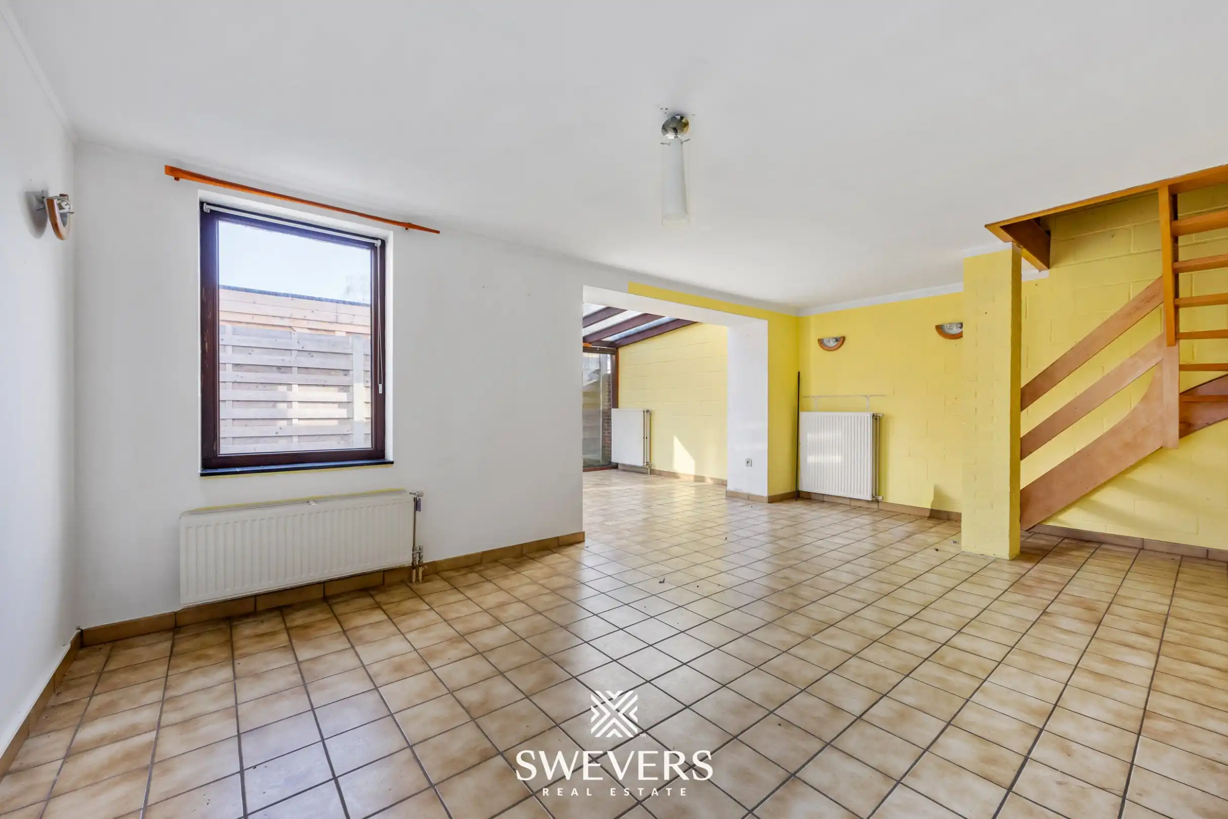 Te renoveren open bebouwing met ruime volumes en zuidgericht perceel in Heusden   foto 6