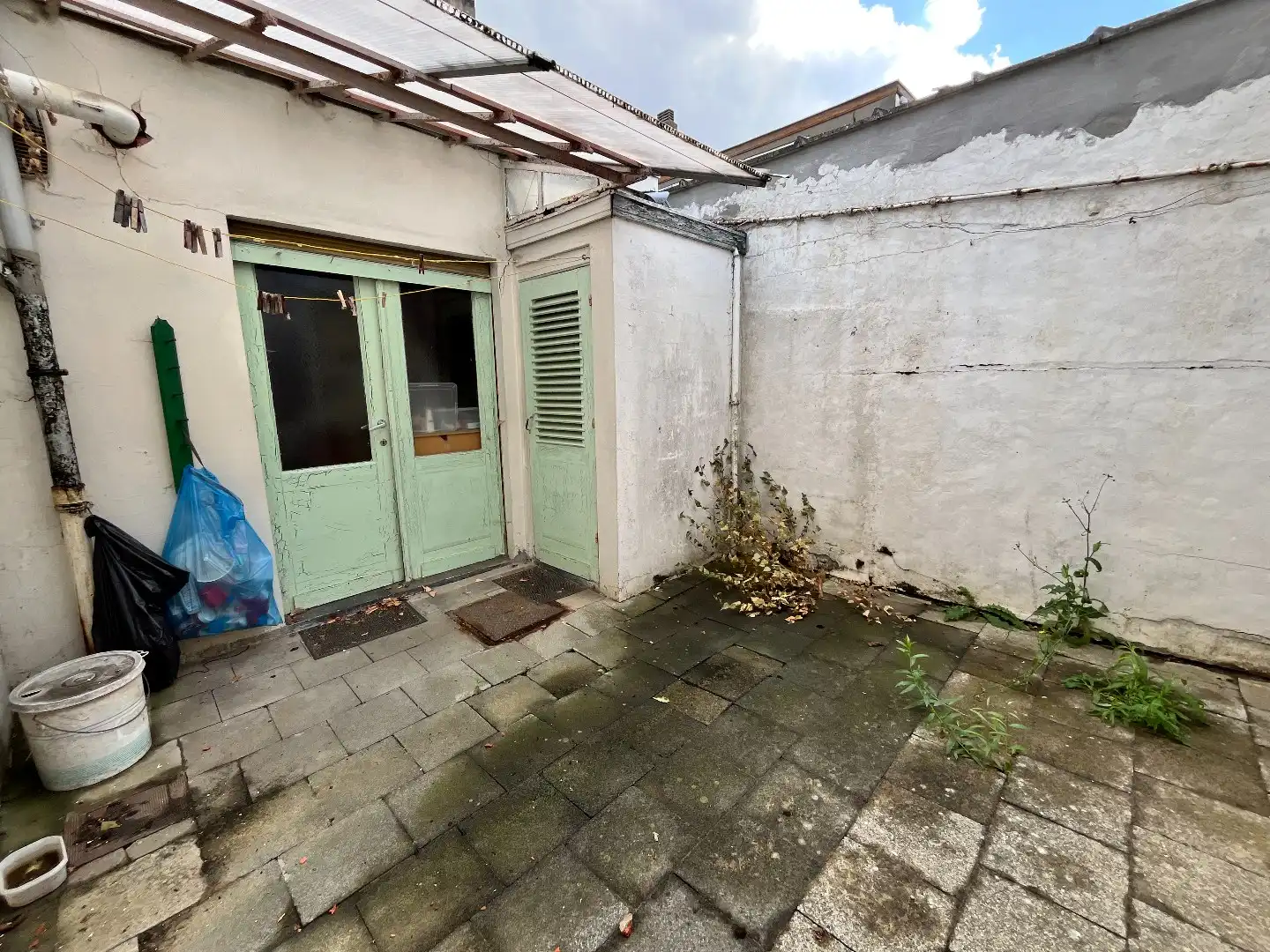 Te renoveren stadswoning met 4 slpk, koer en garage foto 24
