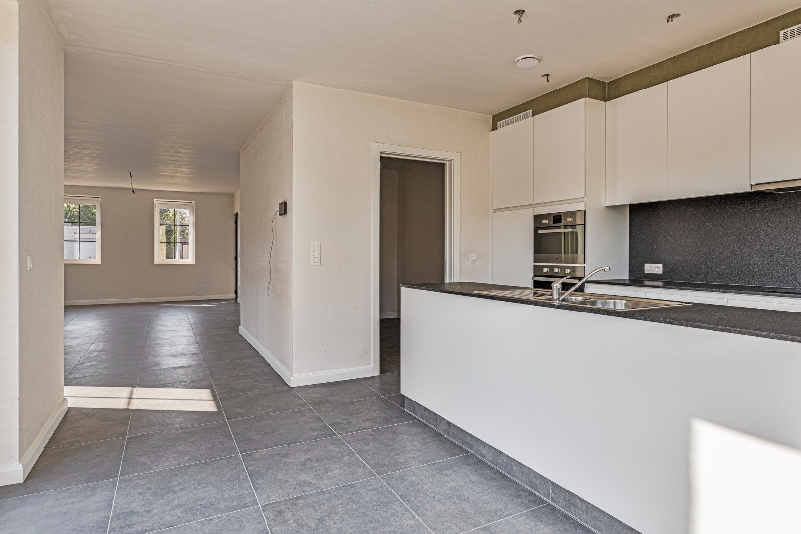 Ruime en kwalitatief afgewerkte nieuwbouw (HOB) met 3 ruime slpks op 412 m² te Olen ! foto 7