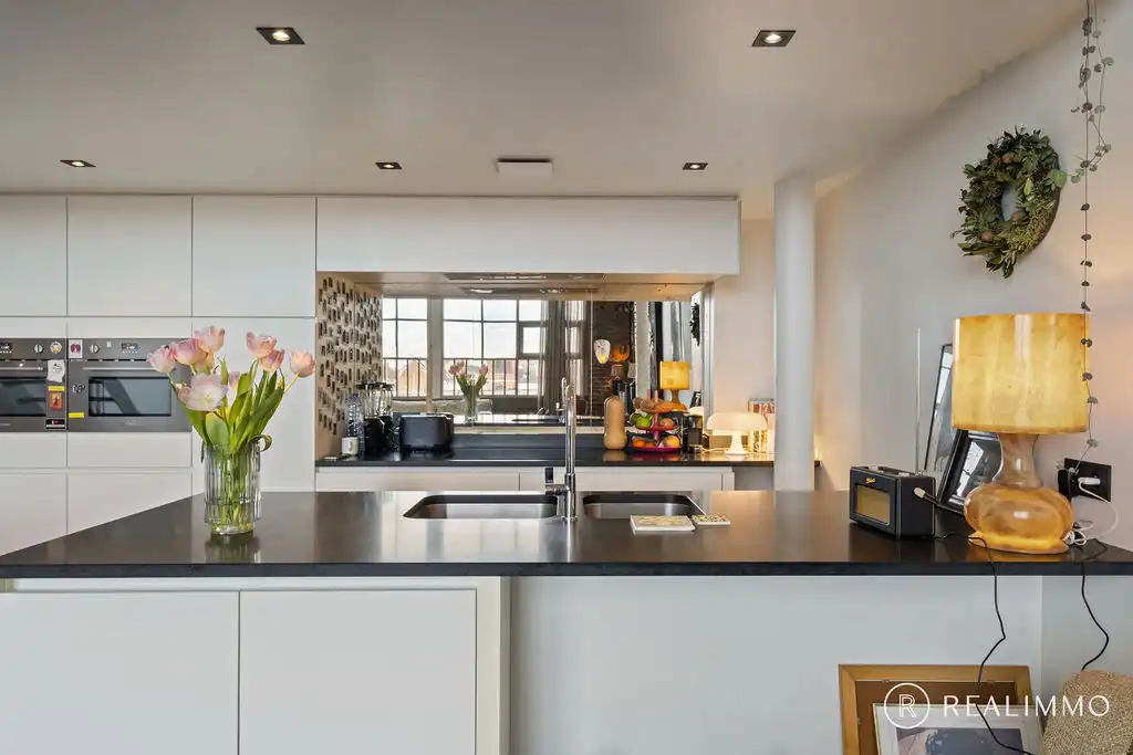 Exclusieve loft met privatieve staanplaats en kelderberging! foto 10