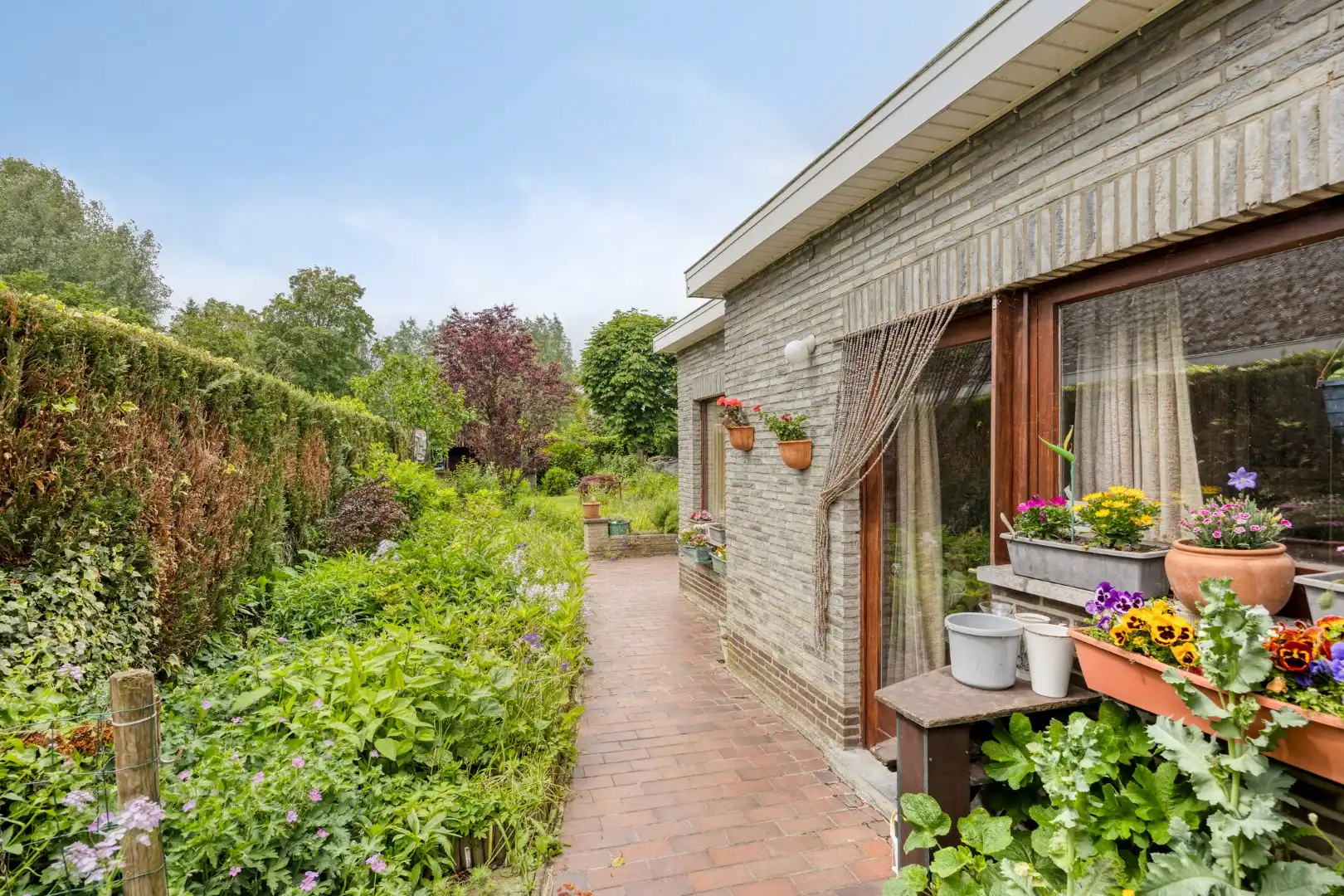 Te koop in Merchtem – Halfopen bebouwing met zonnige tuin op 4a 84ca foto 13