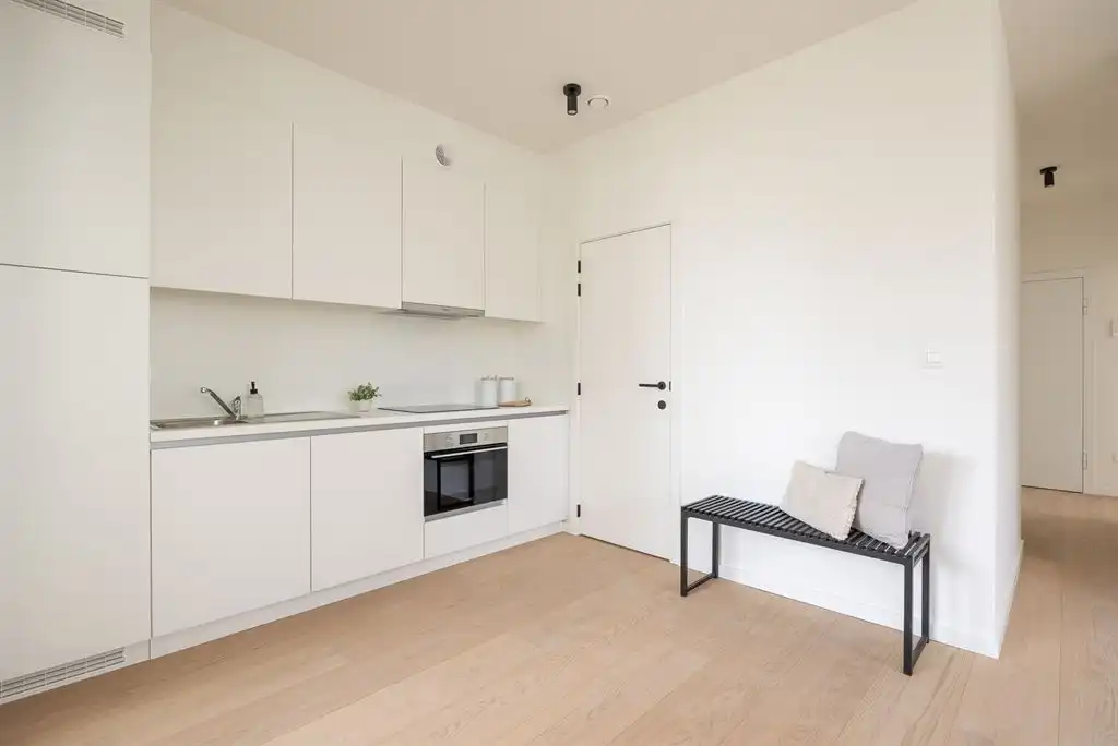 lichtrijk nieuwbouwappartement met terras foto 7