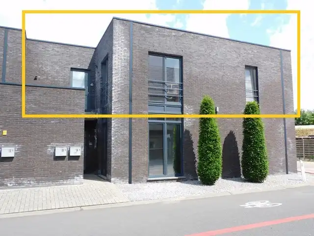 Rustig gelegen, energiezuinig appartement met carport foto {{pictureIndex}}