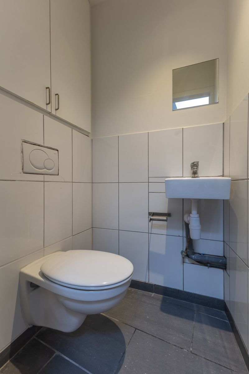 Commercieel gelijkvloers met duplex in centrum Halle foto 9