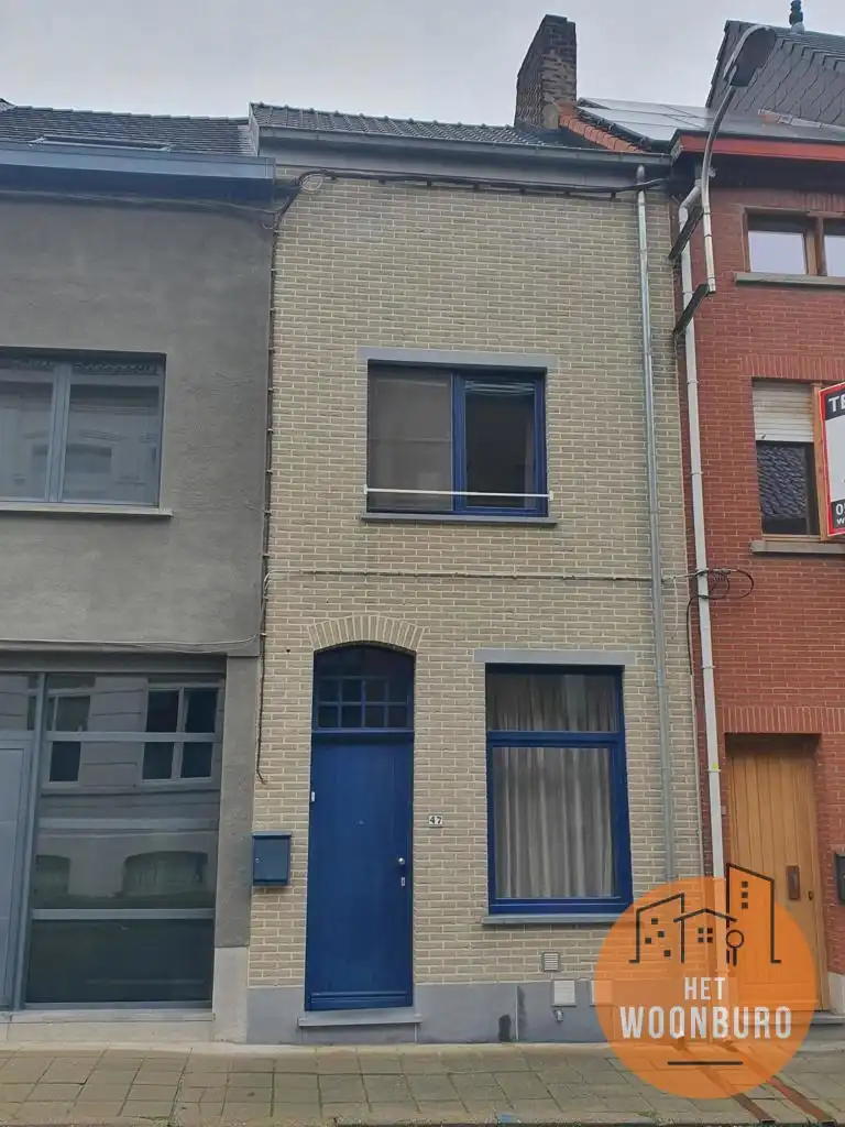 Gerenoveerde rijwoning met terras en tuintje foto {{pictureIndex}}