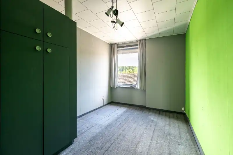 Zeer ruime, te renoveren woning met mogelijkse uitweg. foto 19