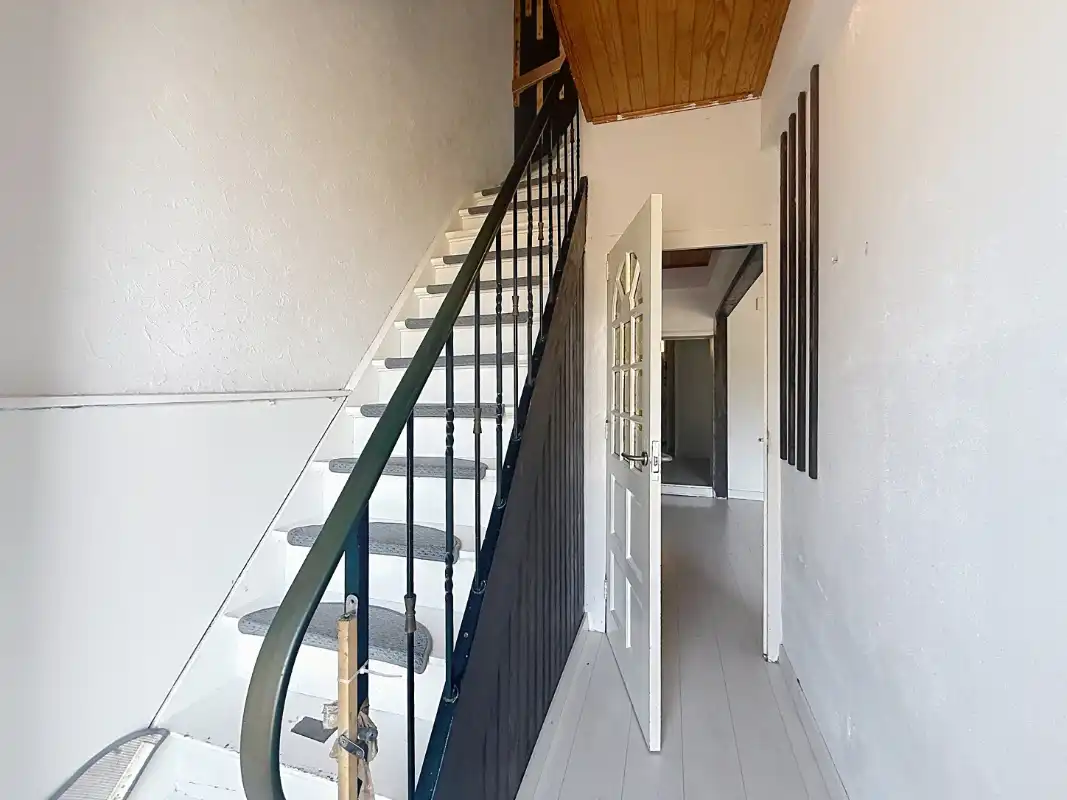 Rijwoning met 3 slaapkamers en uitweg foto 2