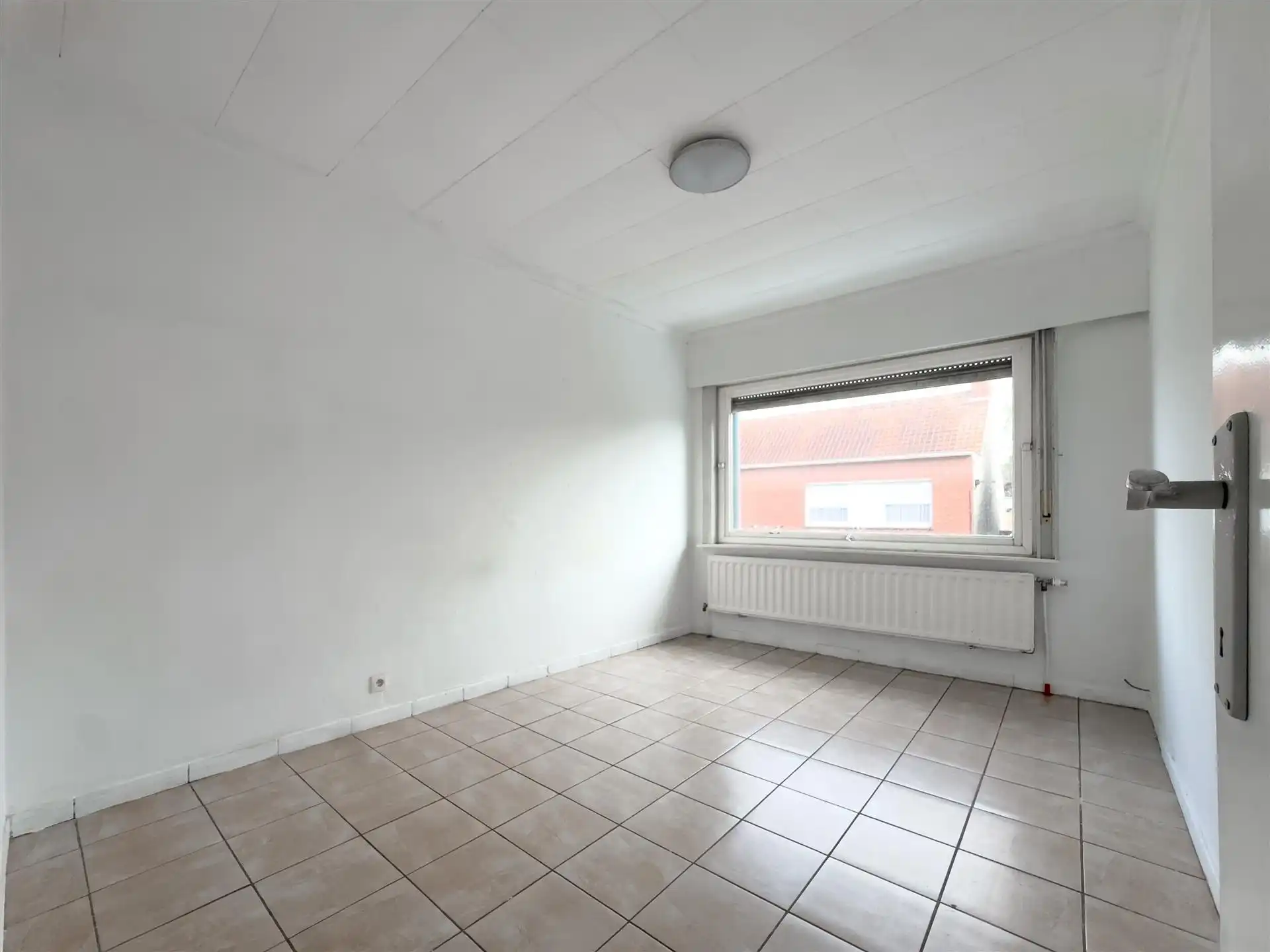 Rustig gelegen gezinswoning in het charmante Moere. foto 8