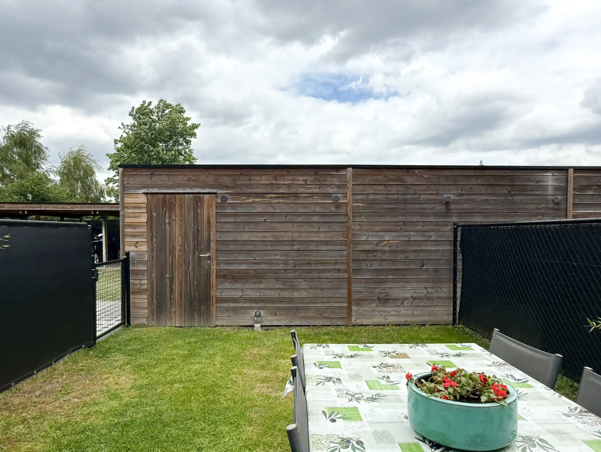 Gelijkvoers appartement met twee slaapkamers en tuin in het hartje van Beveren foto 11