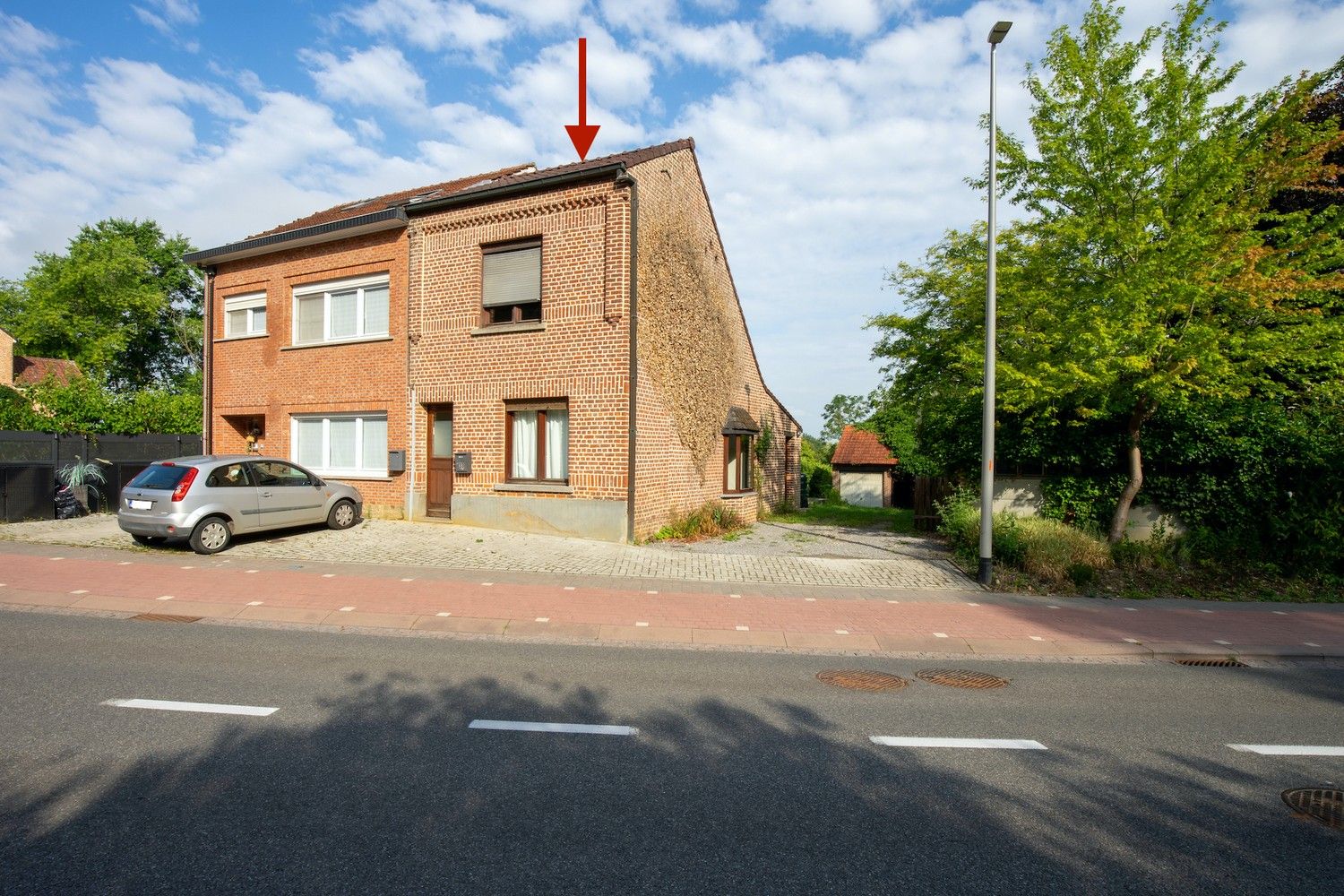 Charmante halfopen woning met 3 slaapkamers, ruime garage en gunstige ligging in Holsbeek foto 2
