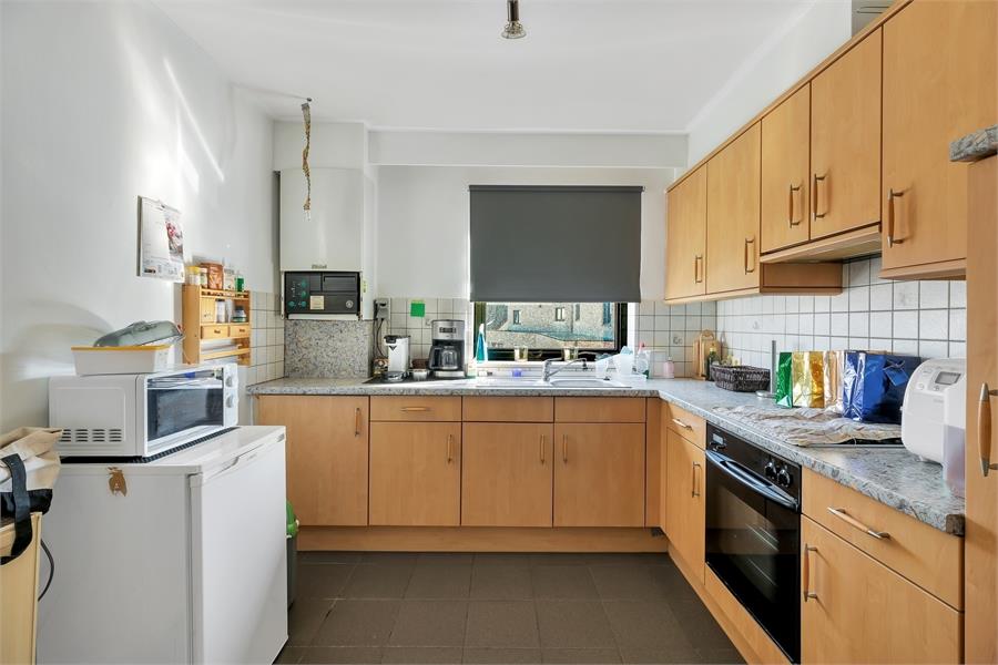 Opbrengsteigendom met 4 verhuurde appartementen en bouwgrond foto 19