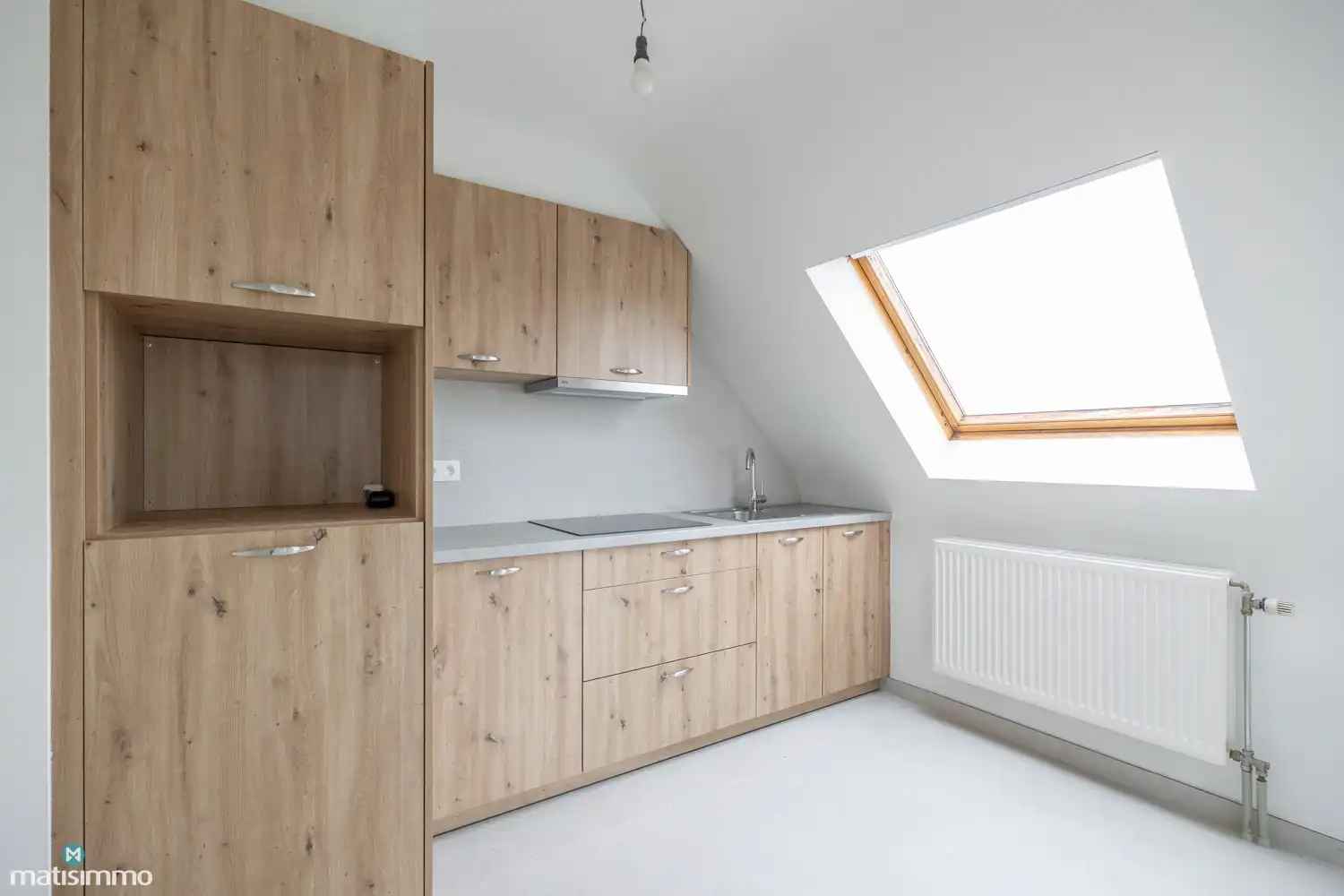 INSTAPKLAAR DUPLEXAPPARTEMENT MET 2 SLAAPKAMERS EN GARAGE NABIJ HET CENTRUM VAN BILZEN foto 6