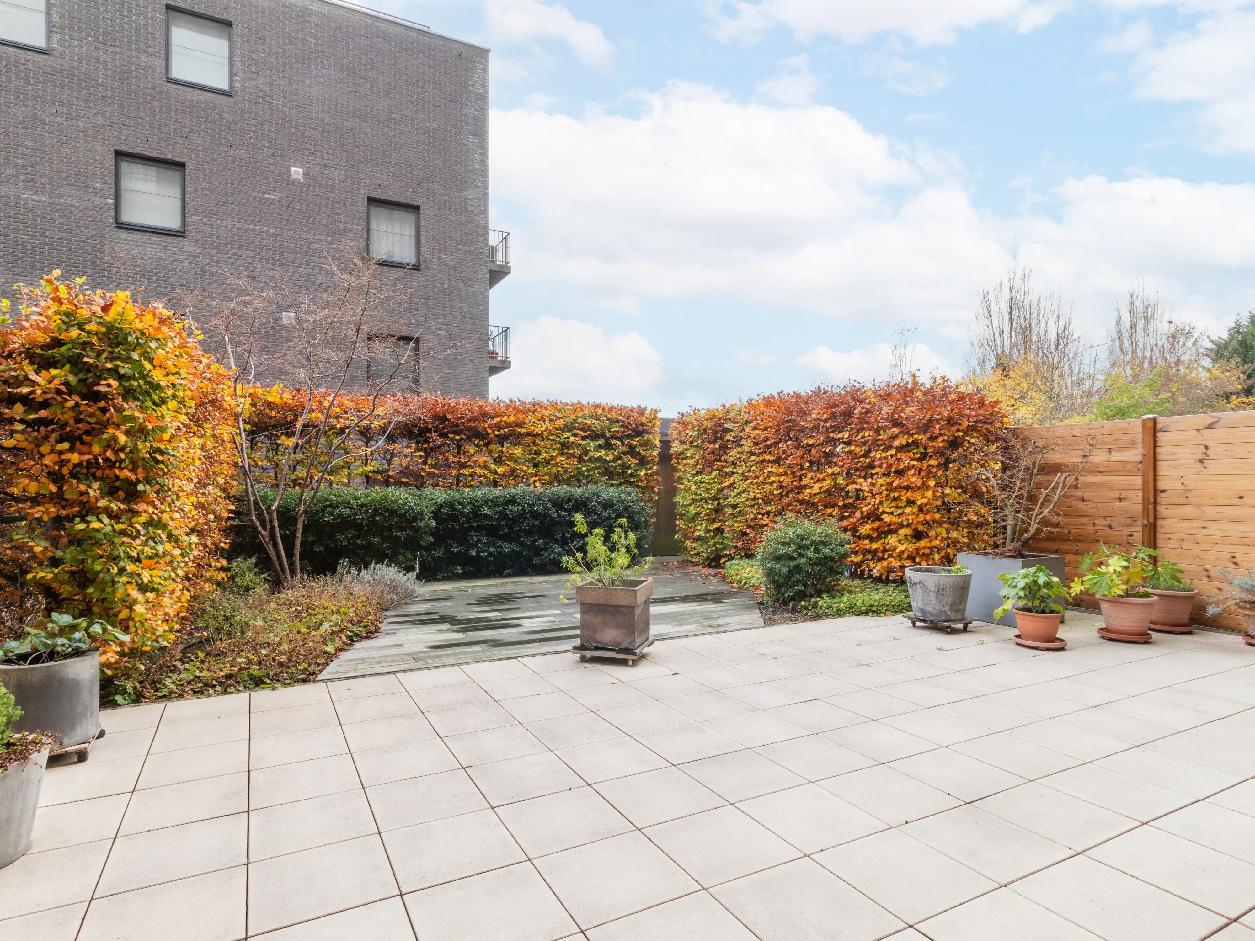 Ruim duplexappartement met garagebox en tuin foto 19