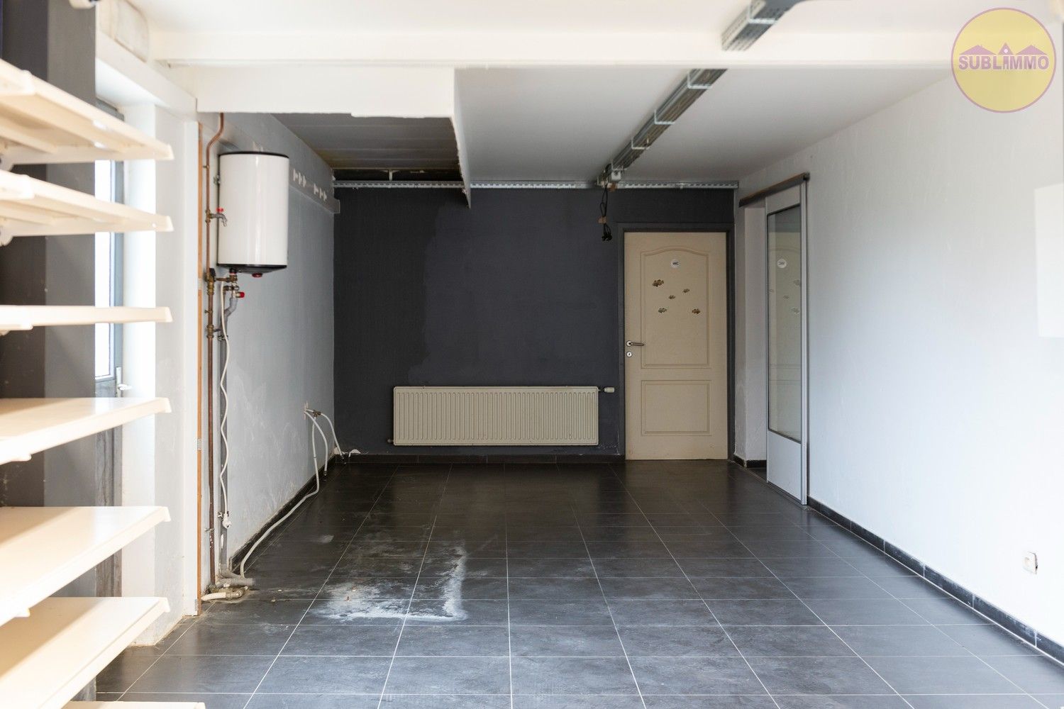 Uniek handelspand met woonst, tuin en tal van mogelijkheden – ideaal als winkel, kantoor, horecazaak, B&B,... foto 9