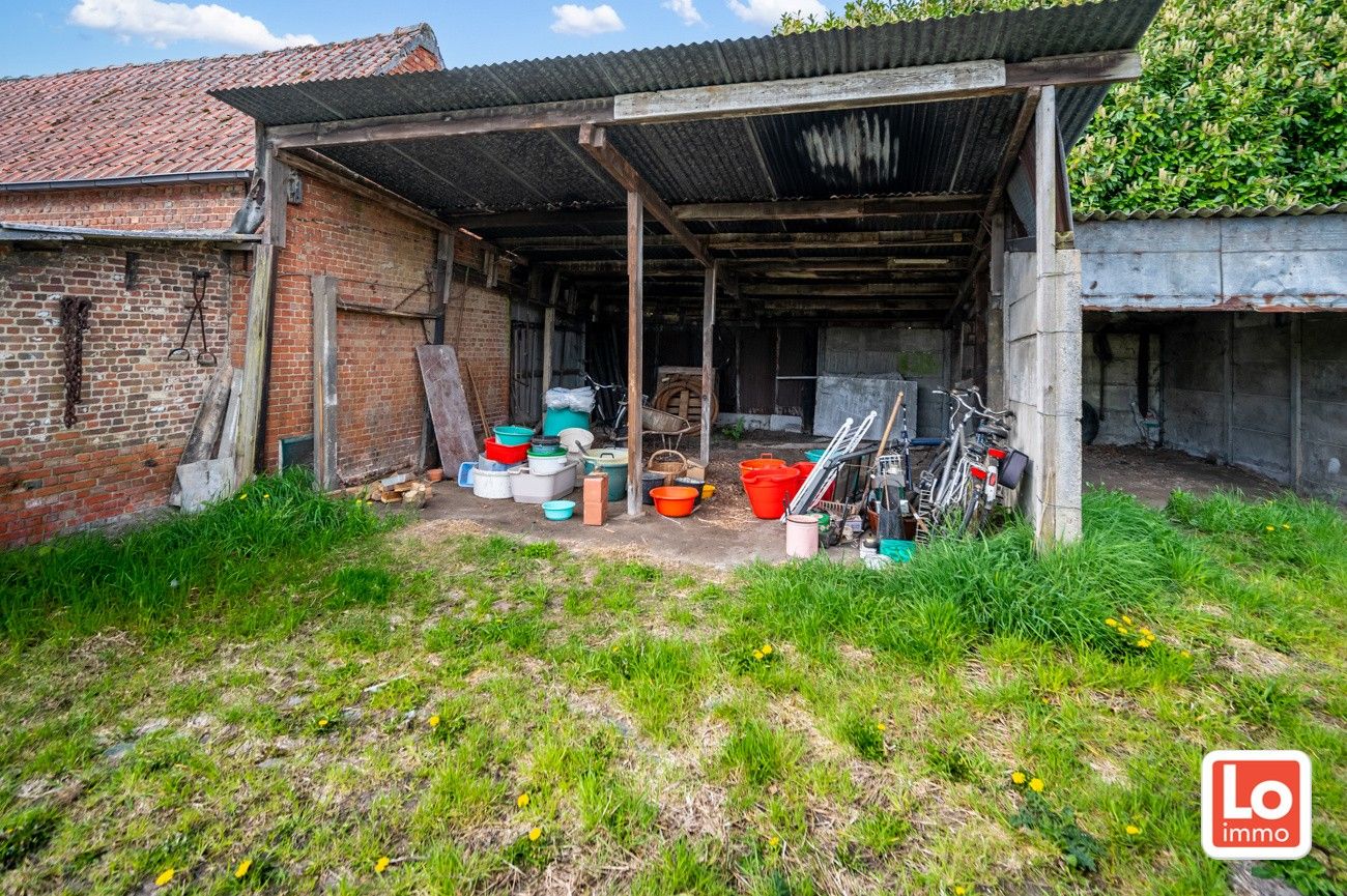 Landelijk gelegen halfopen woning met verschillende stallingen op groot perceel grond met open zicht in Zeveneken! foto 31