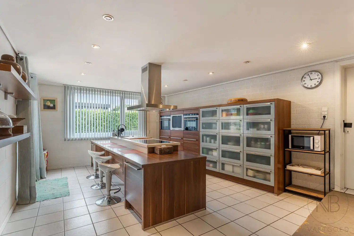 Pand met vergunde praktijkruimte, woonst, garage en carport in Opglabbeek foto 23