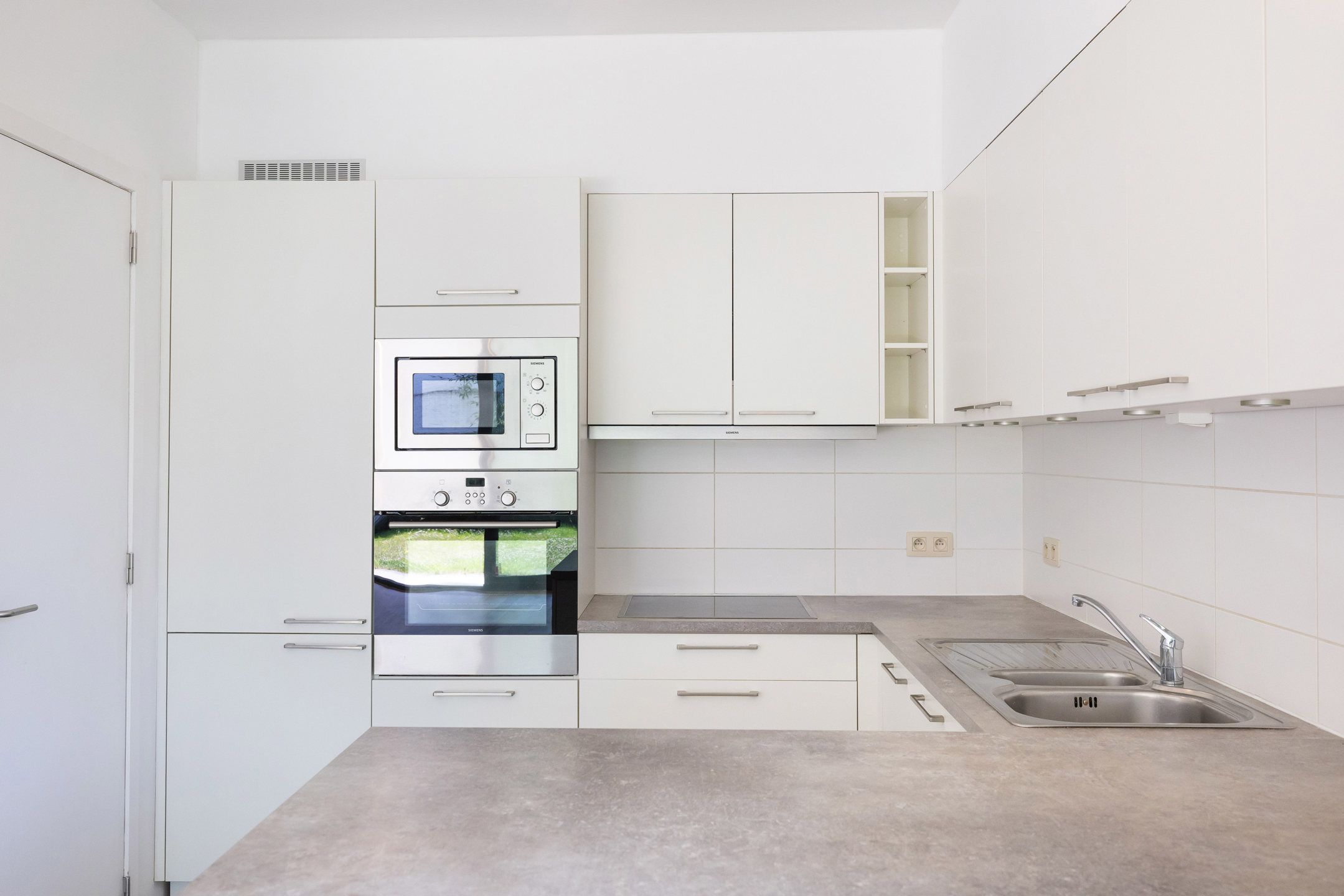 Appartement 3 slaapkamers ± 130 m² + tuin ± 200 m² + parkeerplaats foto 6
