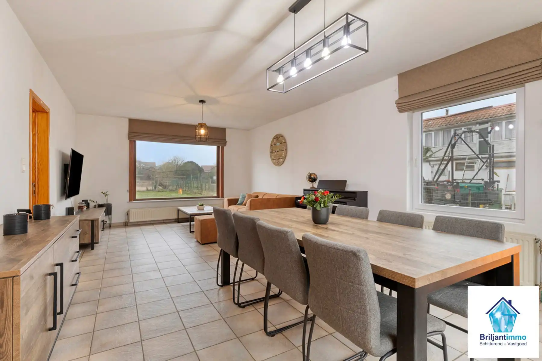 Open bebouwing met 3 slp, garage en tuin in rustige buurt foto 5