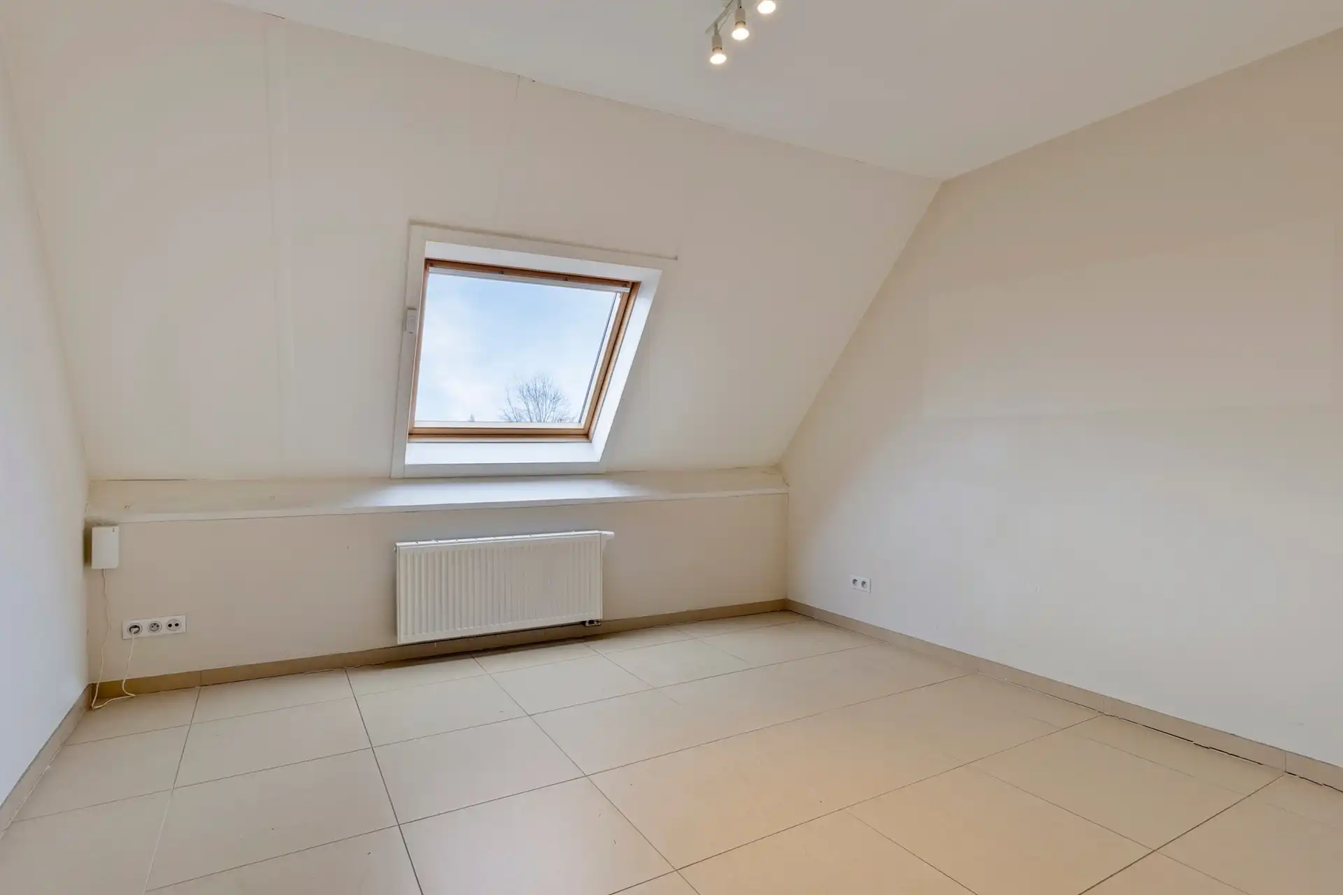 Lichtrijk duplexappartement met terras en 2 kamers foto 9