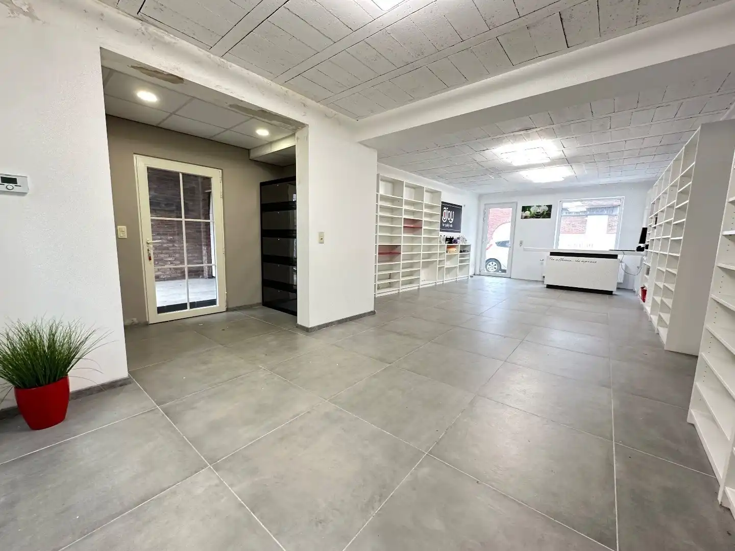 Handelspand met woonruimte gelegen te Tongeren foto 19