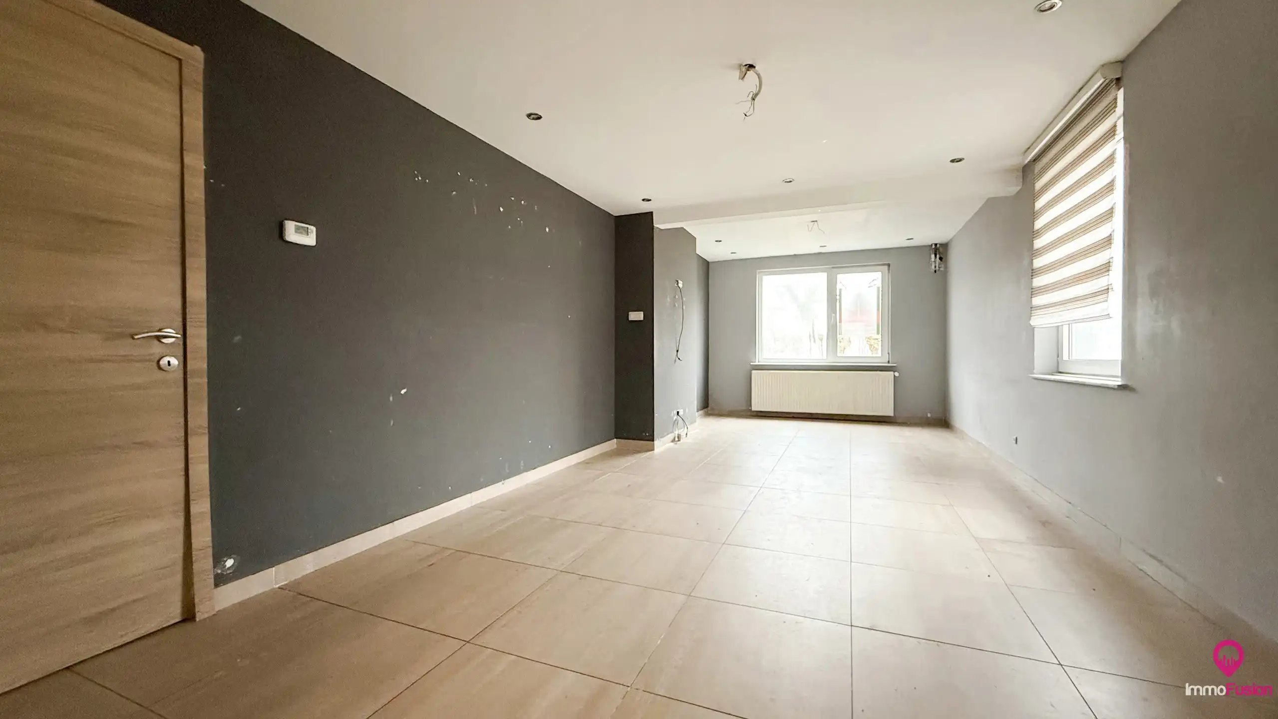 Op te frissen halfopen woning op toplocatie op de Lindeman foto 4