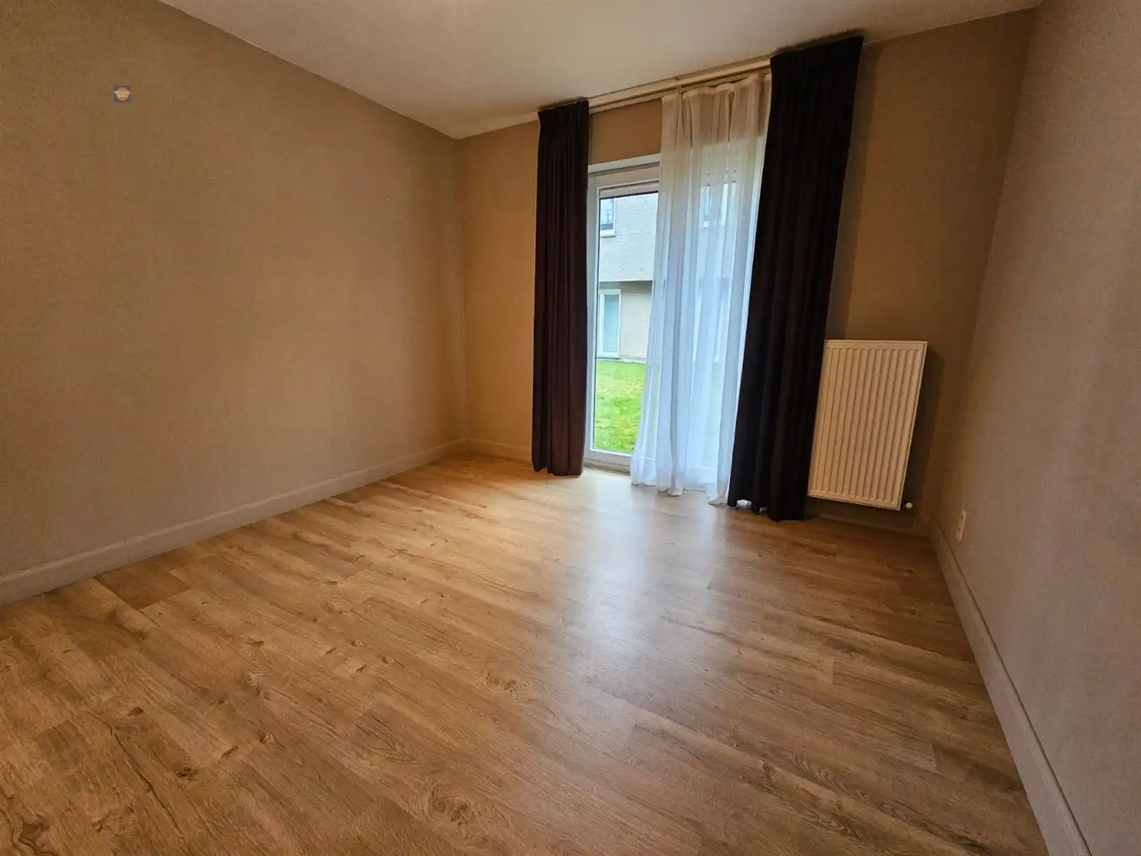 Gelijkvloers 2-slaapkamerappartement, terras en staanplaats foto 4