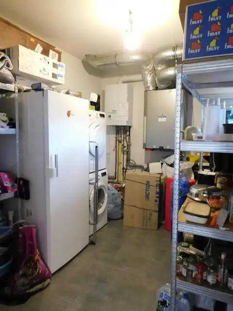 Rustig gelegen, energiezuinig appartement met carport foto 14