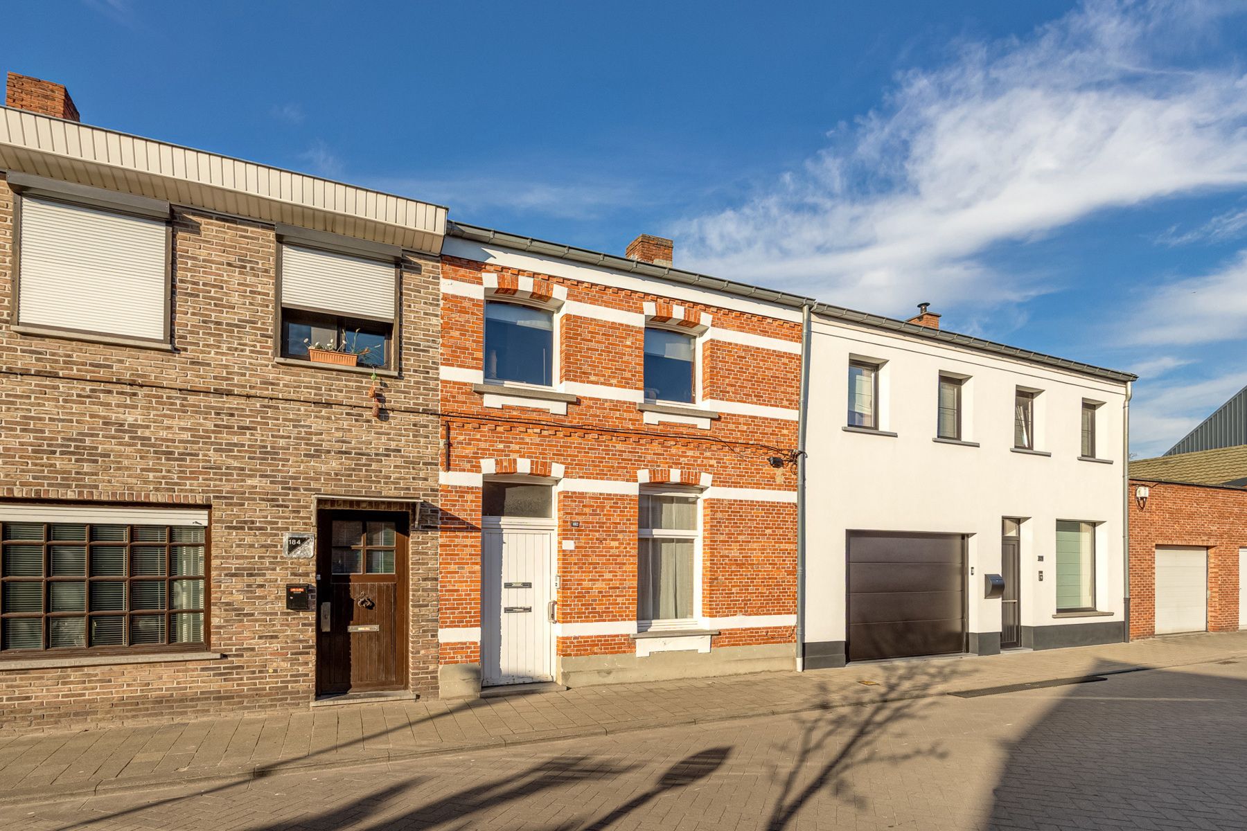 Hoofdfoto van de publicatie: Een woning met stadskoer gelegen op een centrale locatie in Turnhout.