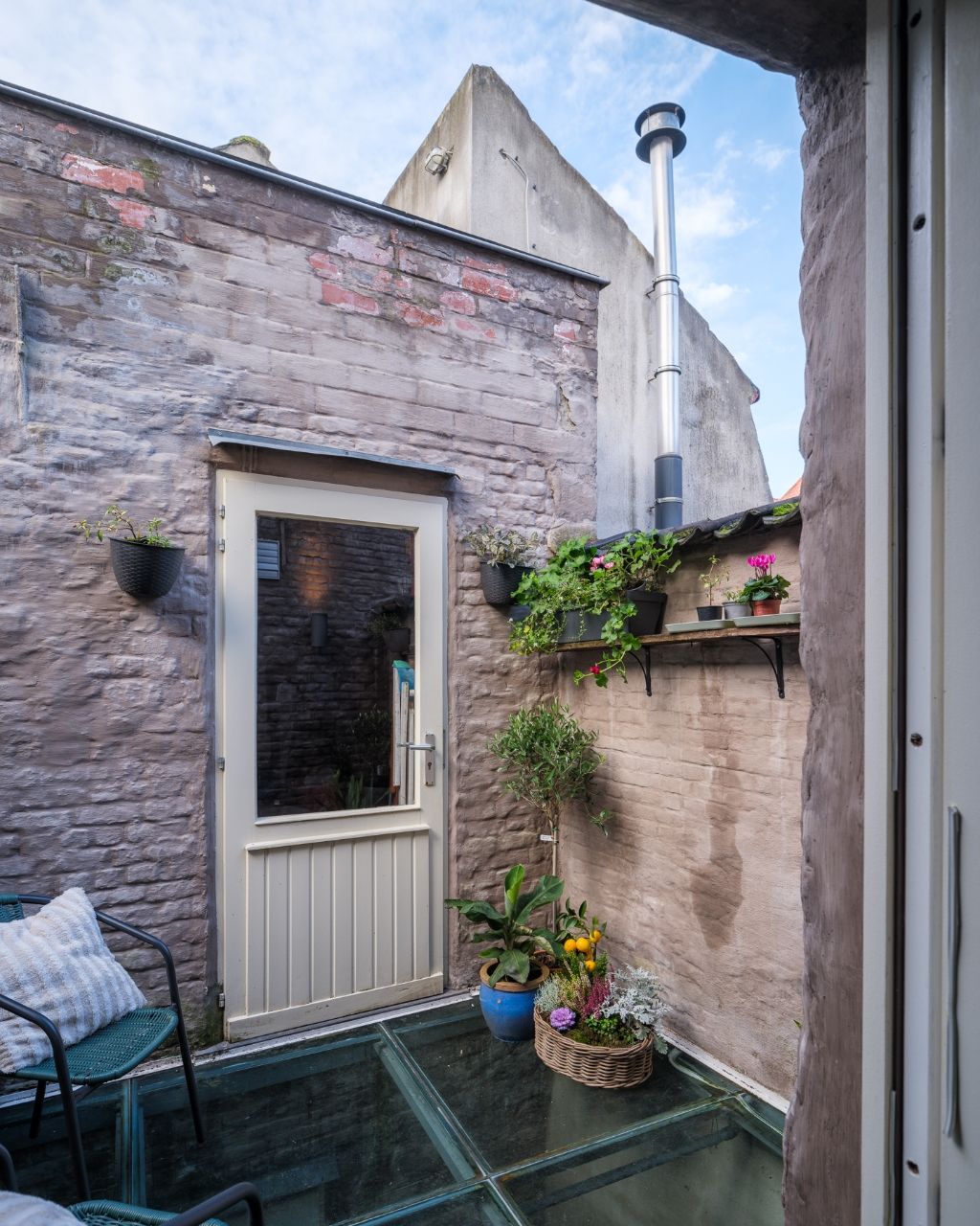 Authentieke stadswoning met twee à drie slaapkamers op 50 m van de Vrijdagmarkt. foto 16