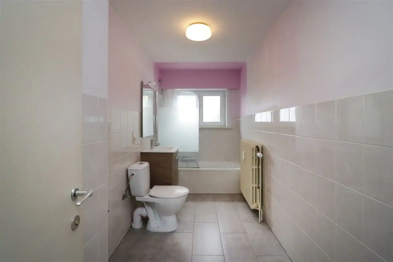 Opbrengsteigendom (handel & 4 app) op toplocatie foto 60