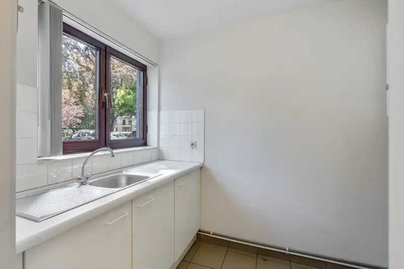 Zeer rustig gelegen gelijkvloers appartement met 3 slaapkamers, tuin en garage foto 12