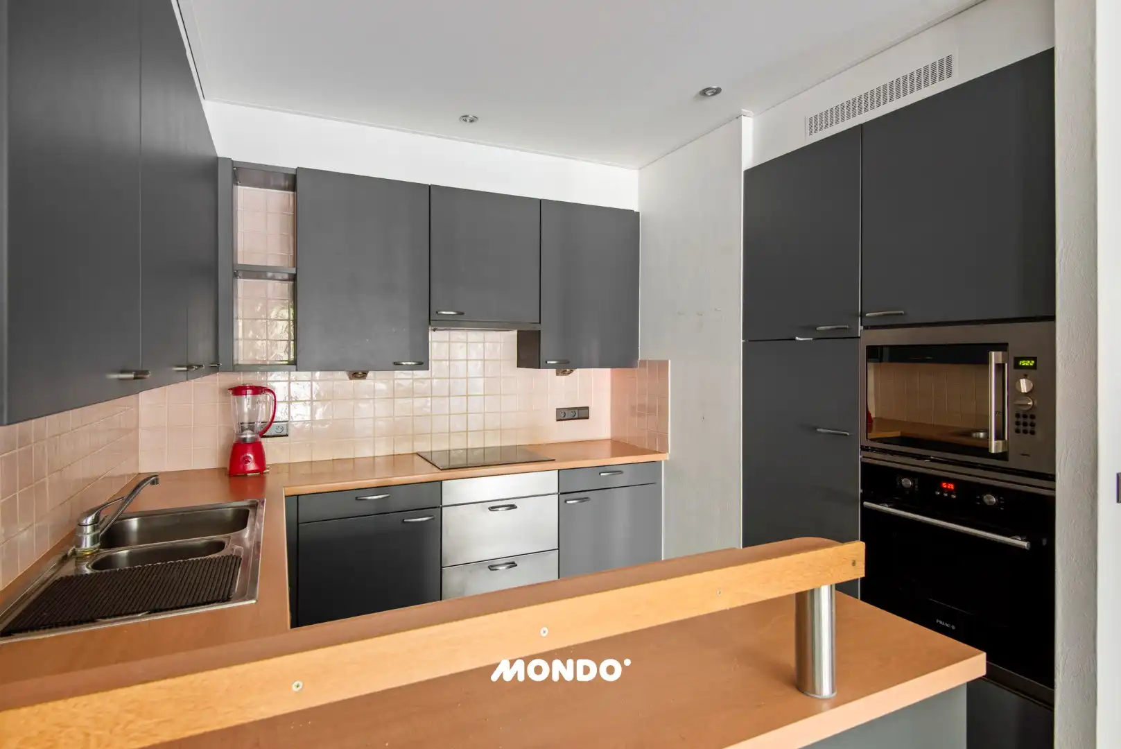 Gelijkvloers appartement met staanplaats en kelderberging! foto 7