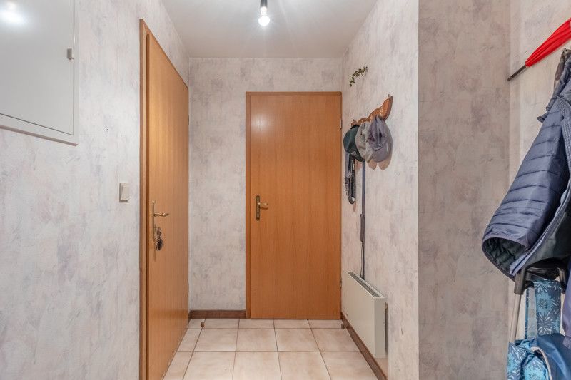 Gelijkvloers appartement met 2 slpkms, autostaanplaats en private berging foto 23